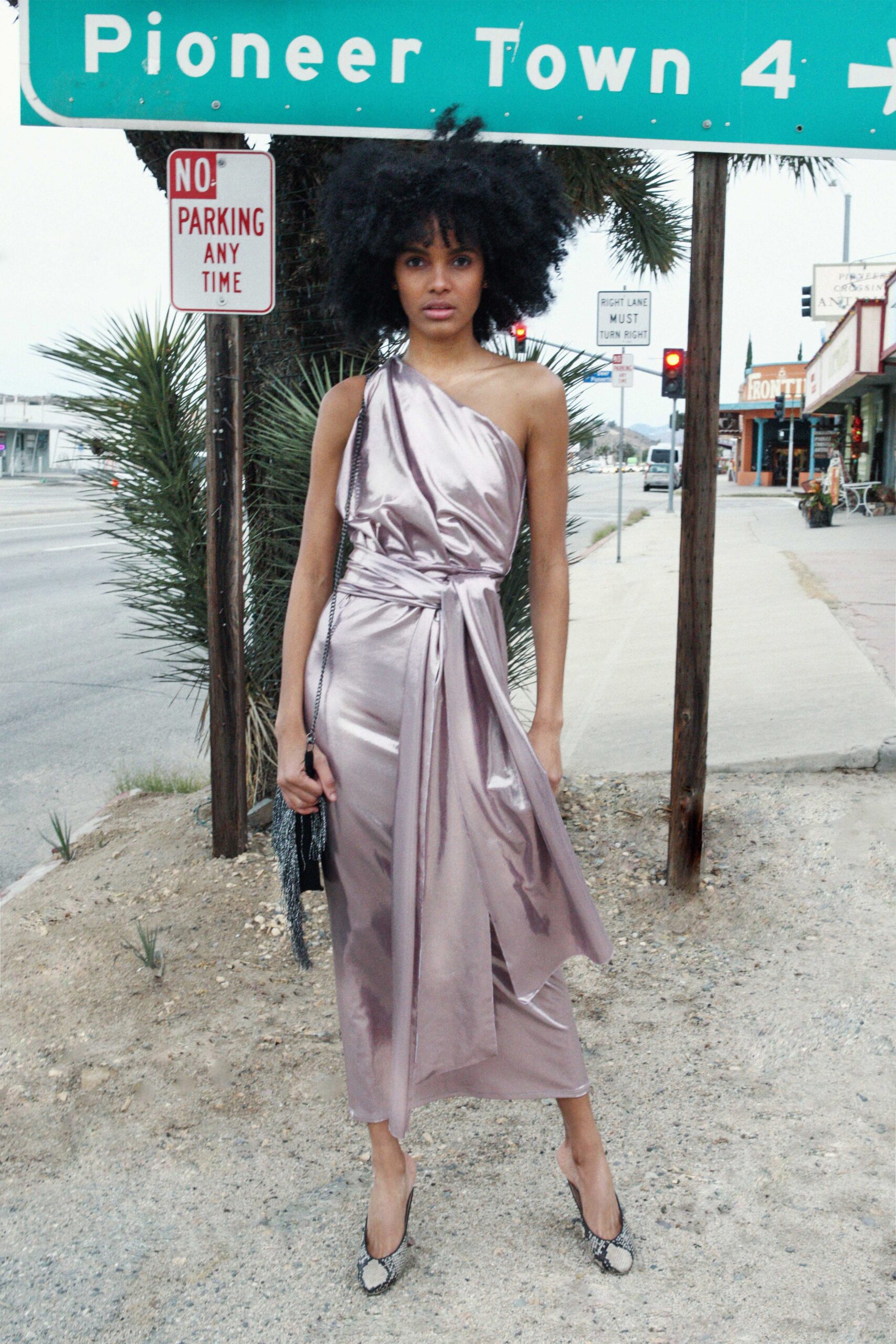 pink silk sleeveless v-neck fitted draped shiny dress