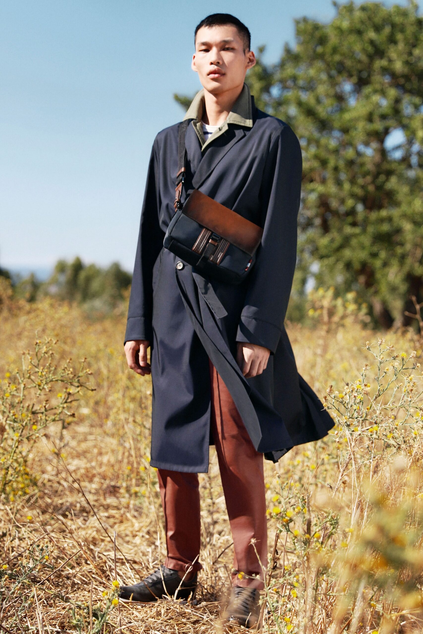 blue cotton long-sleeve collared relaxed buttoned trench