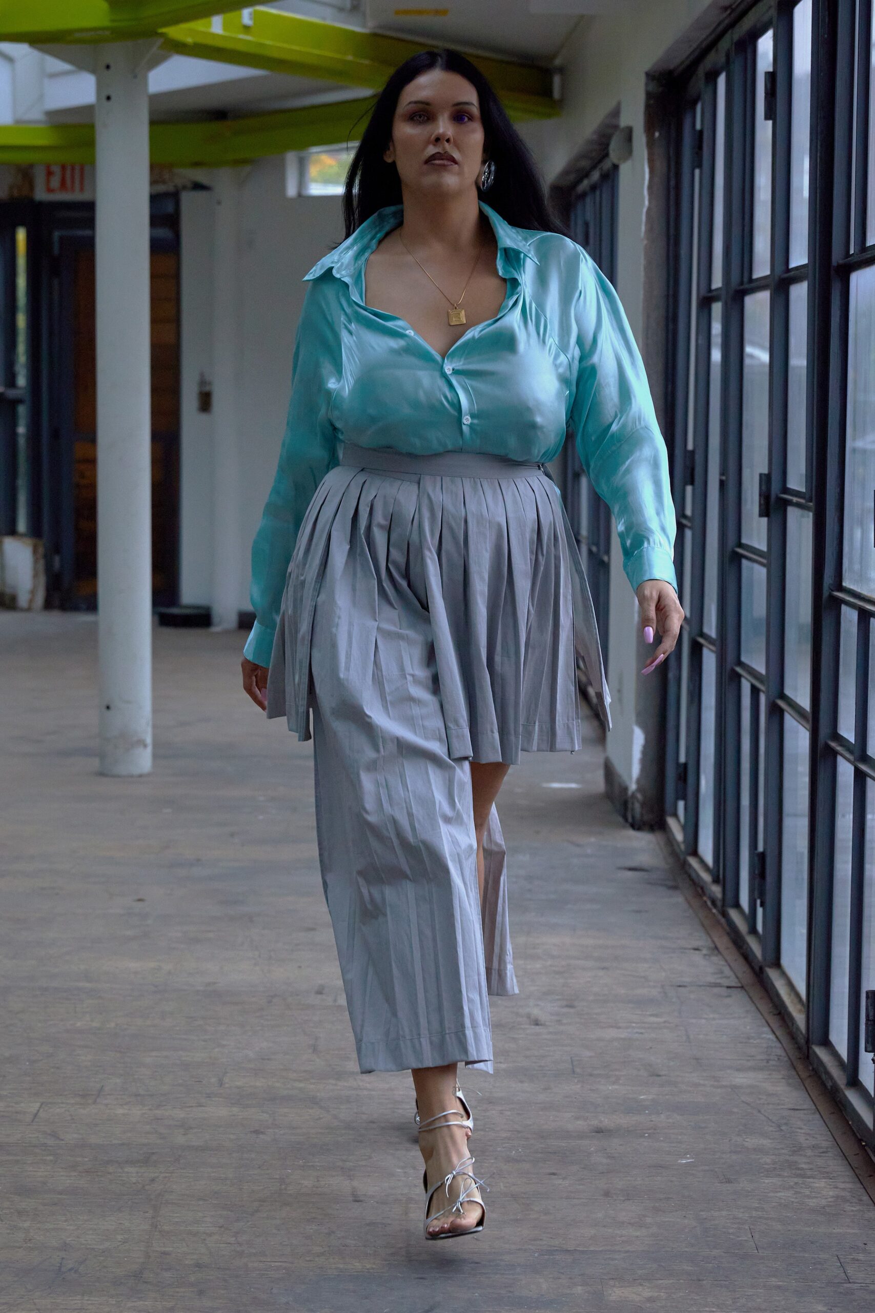 blue silk long-sleeve collared relaxed pleated blouse