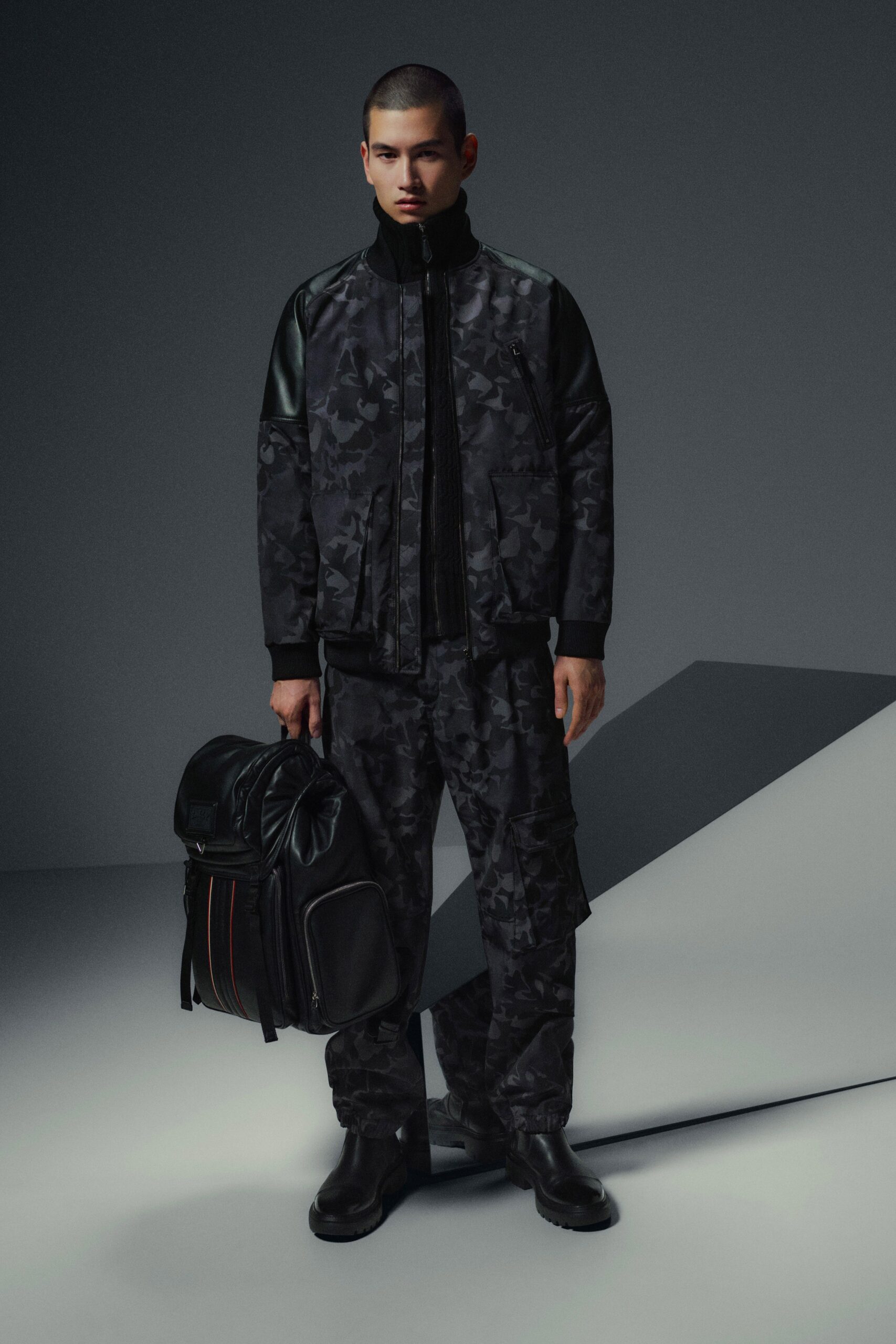 black fitted jacket with cargo pants