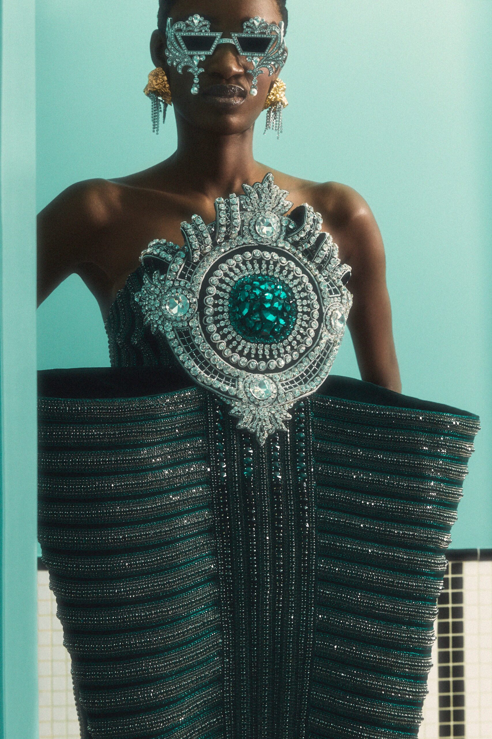 teal embellished strapless gown