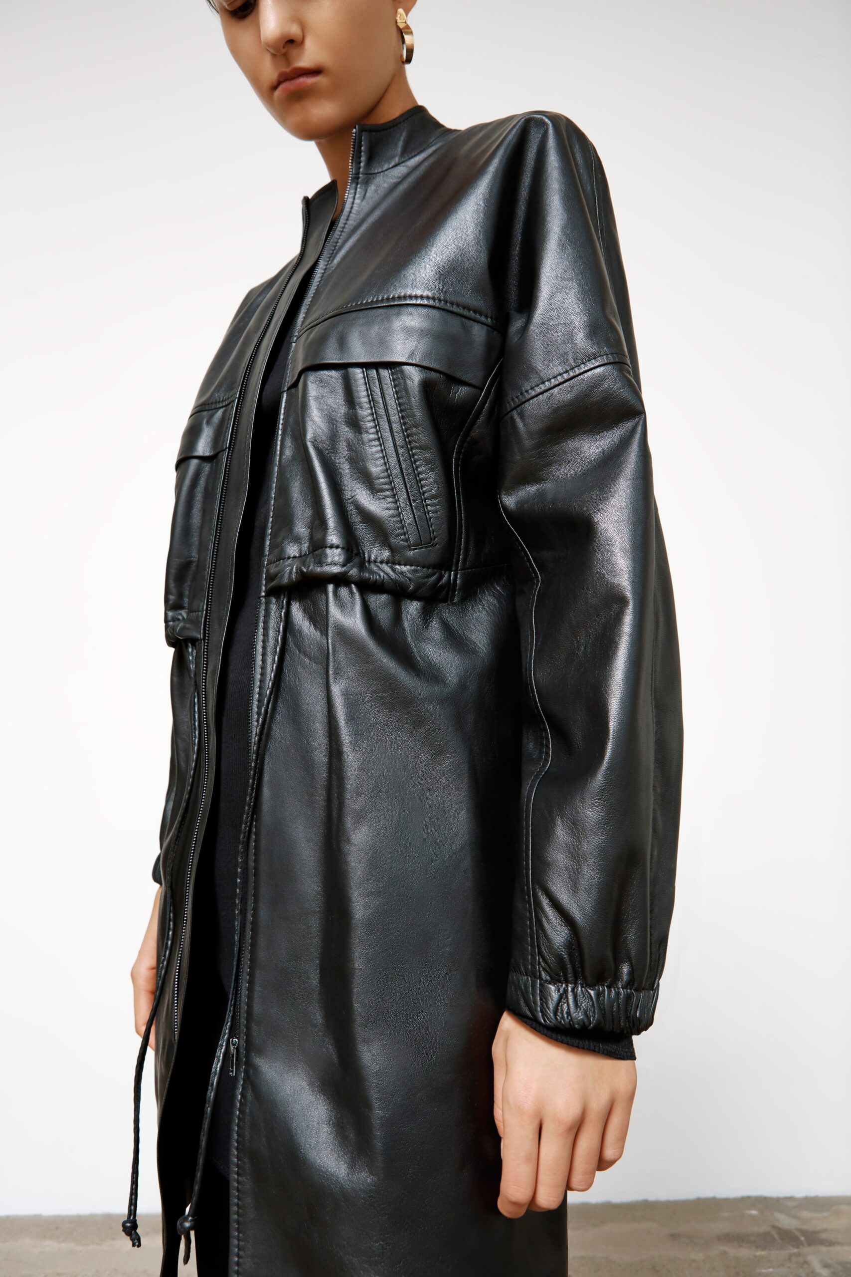 fitted black leather coat