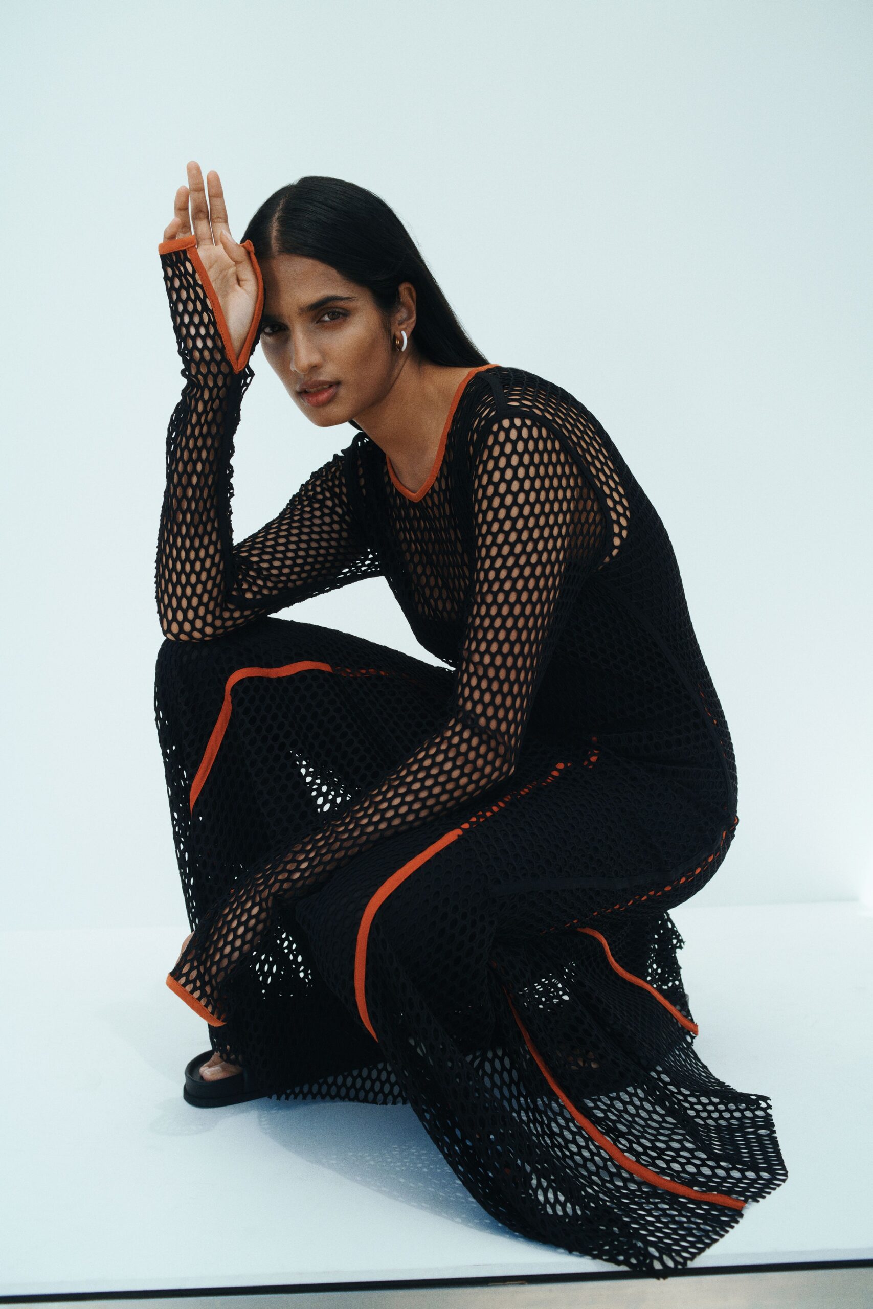 black mesh dress with red accents