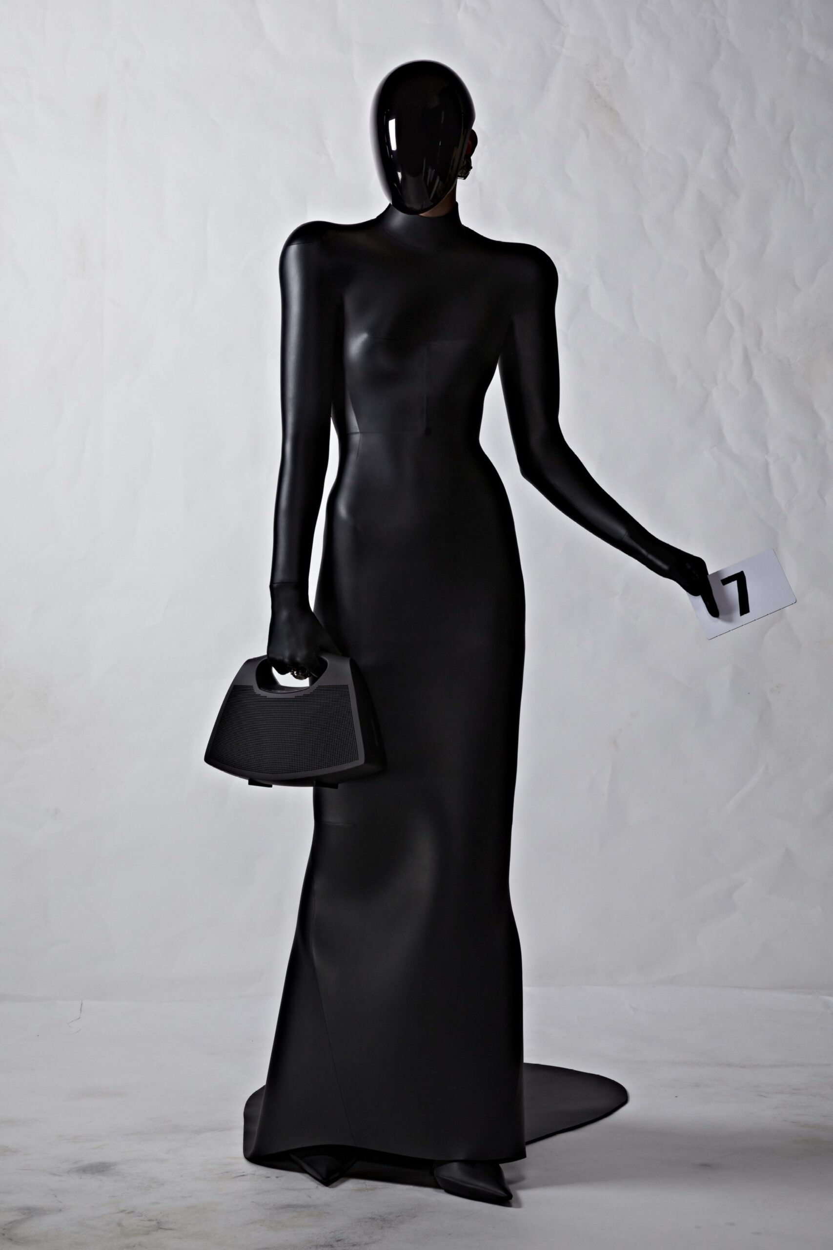 black fitted vinyl gown