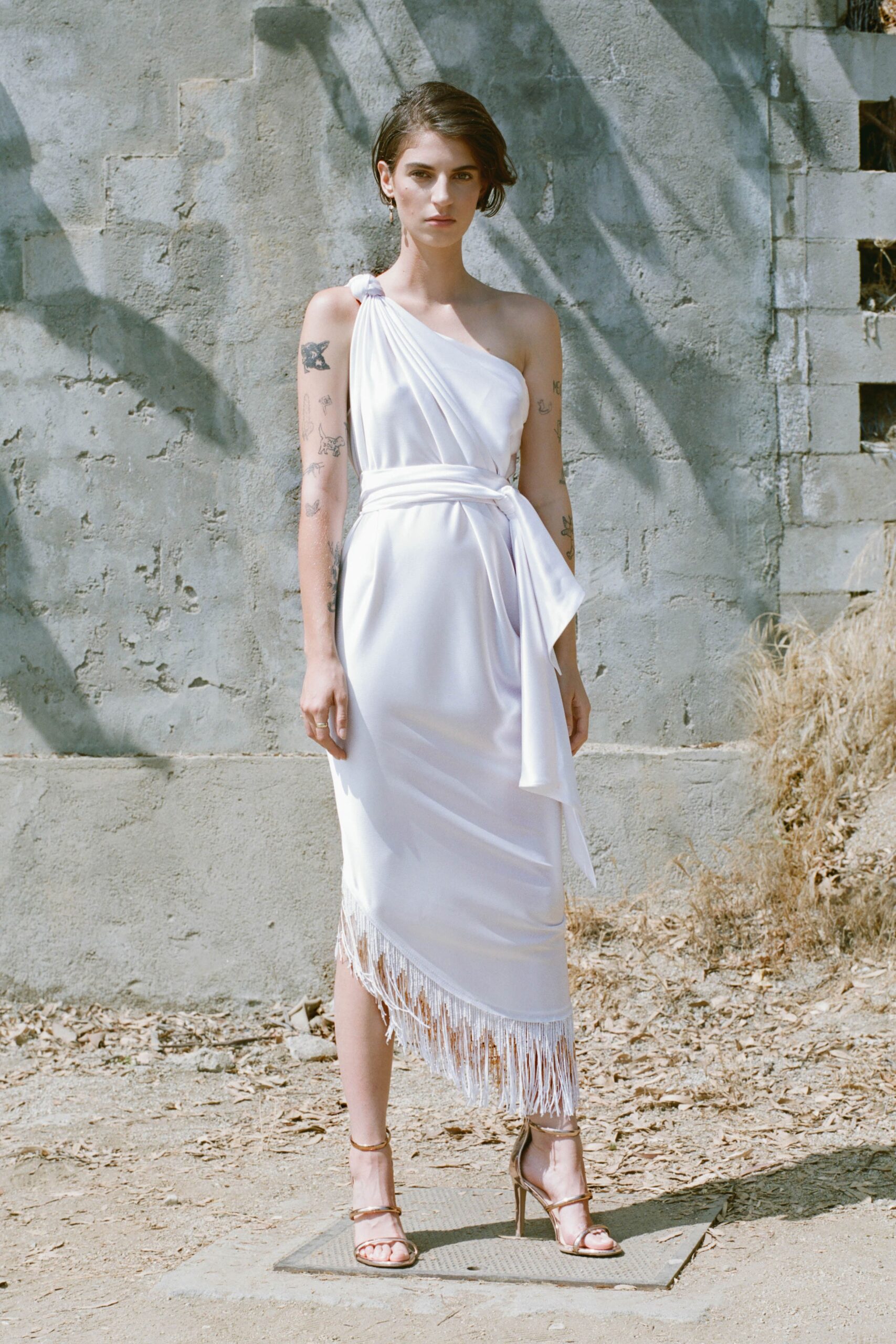 white silk halterneck dress