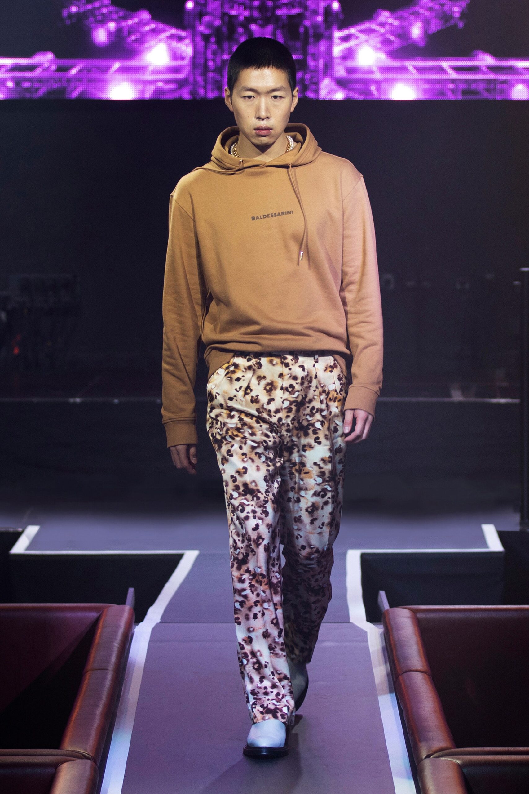 brown hoodie and printed pants