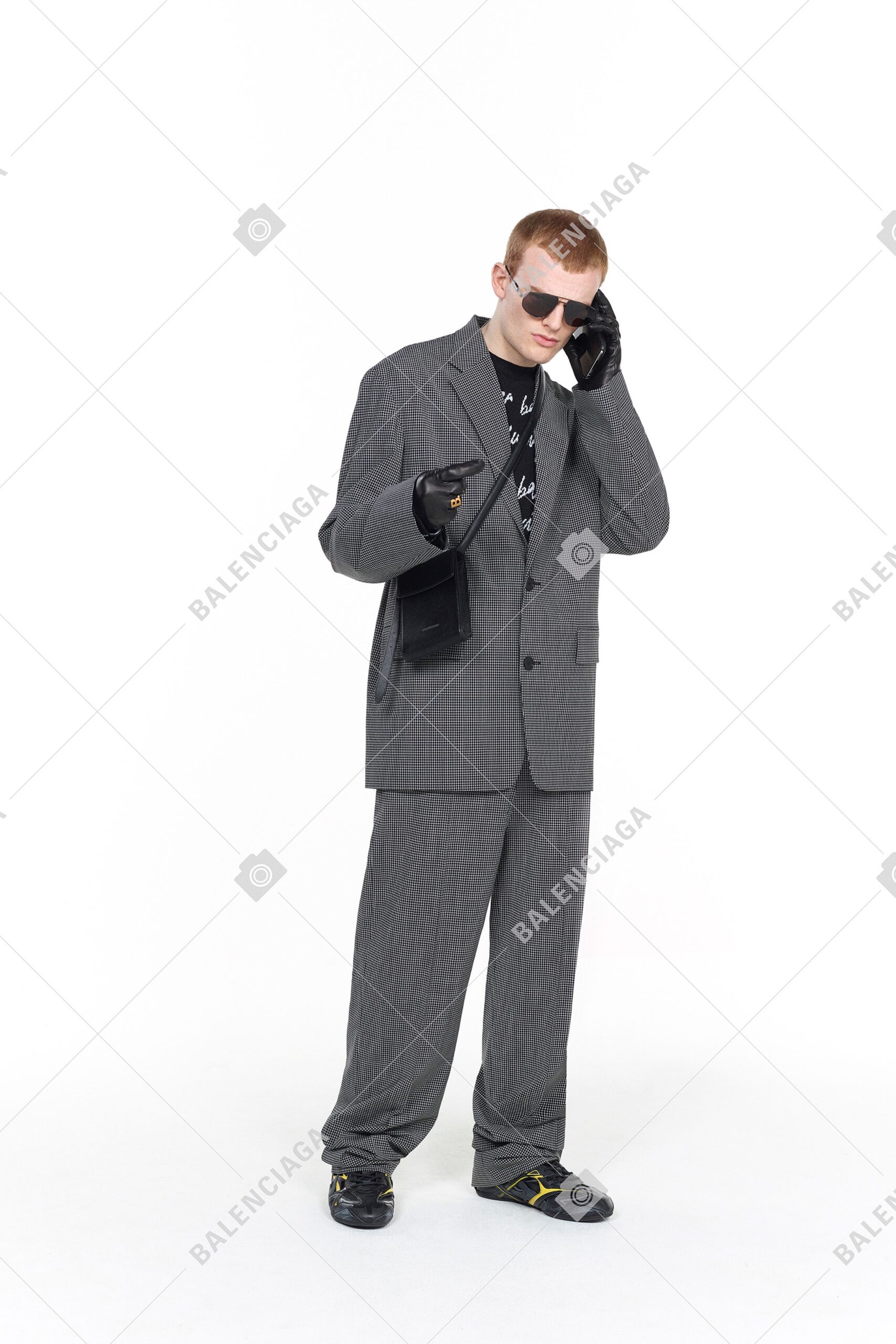 gray relaxed suit with black t-shirt