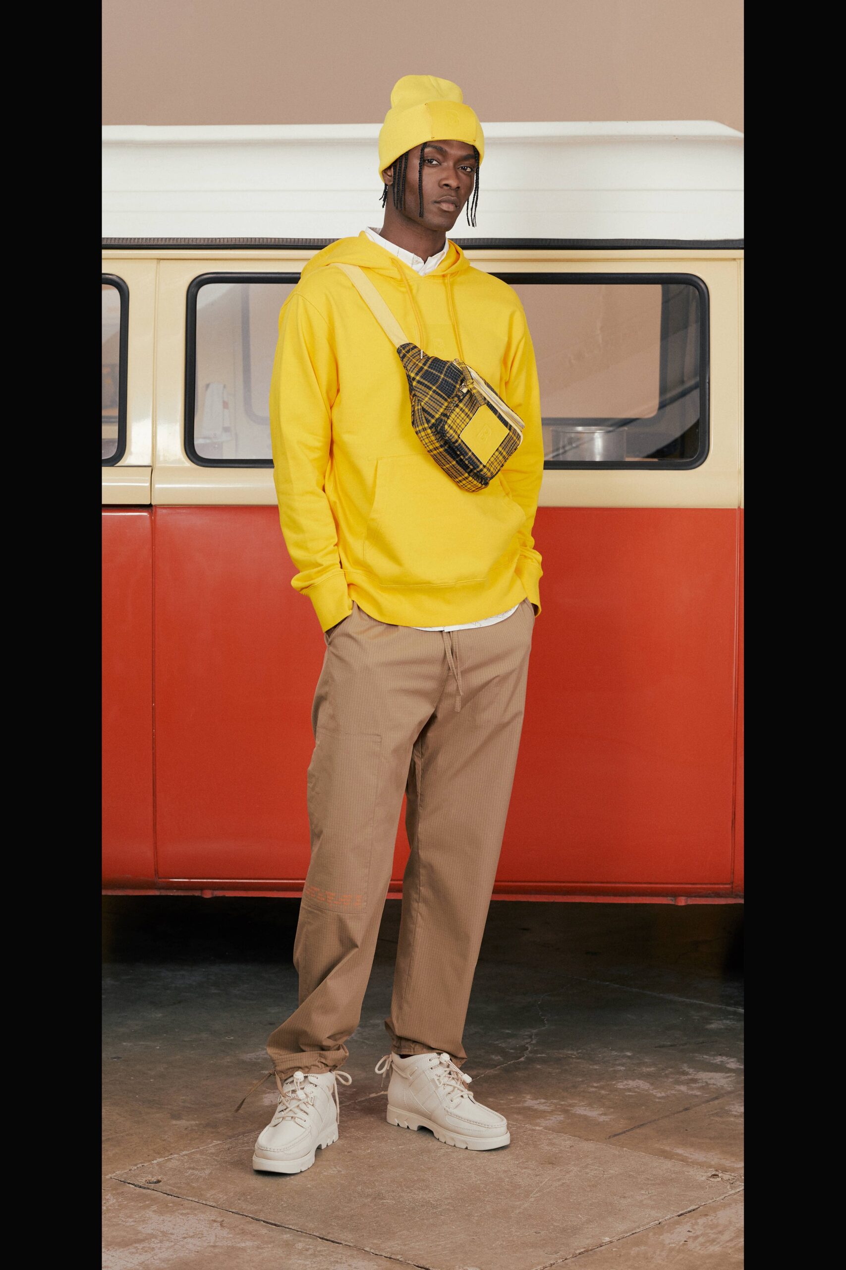 yellow hoodie with beige pants
