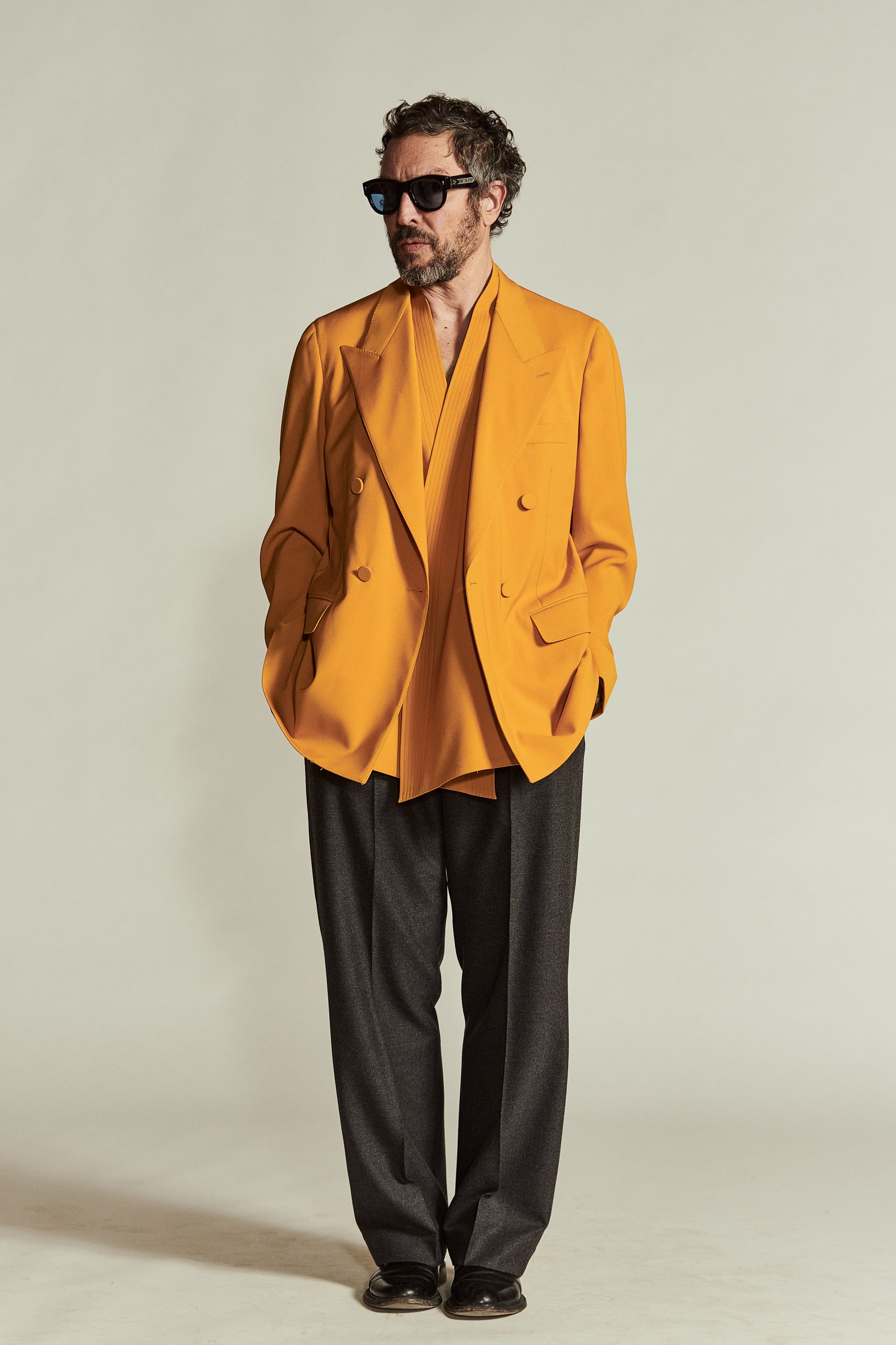 yellow blazer with beige shirt