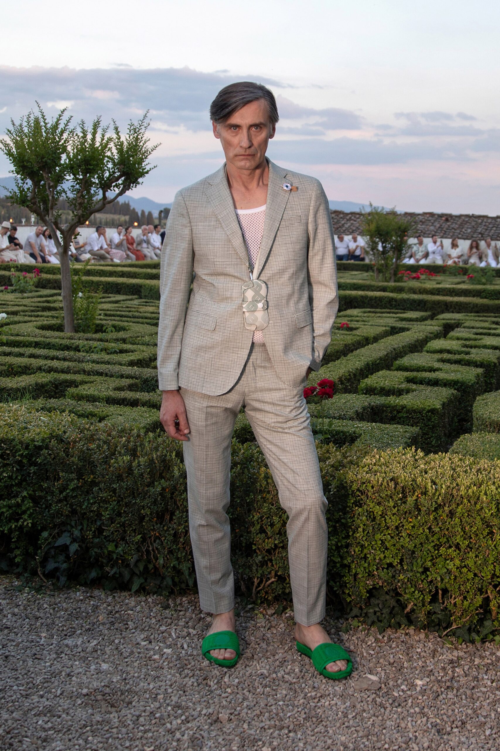 gray tailored suit with green shoes