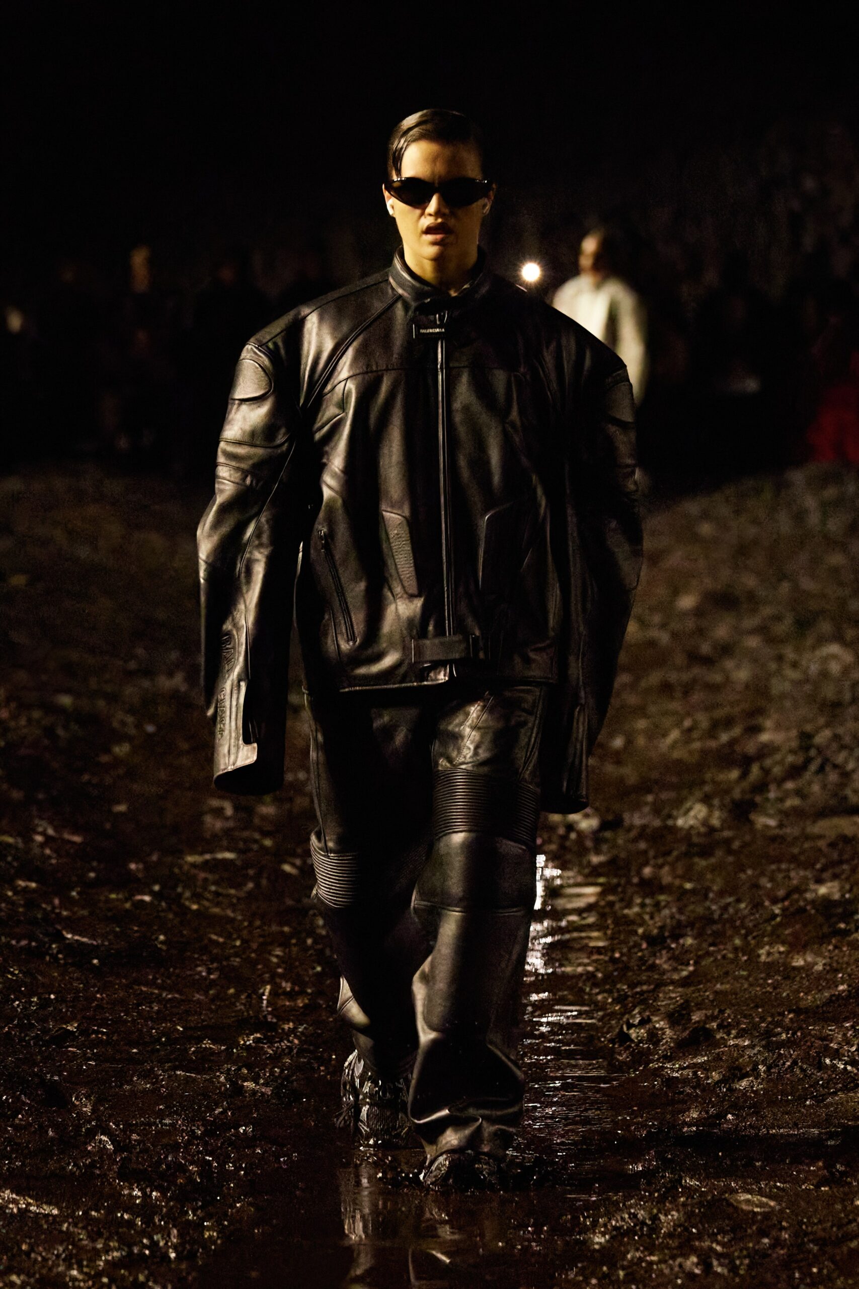 black oversized leather jacket and fitted pants