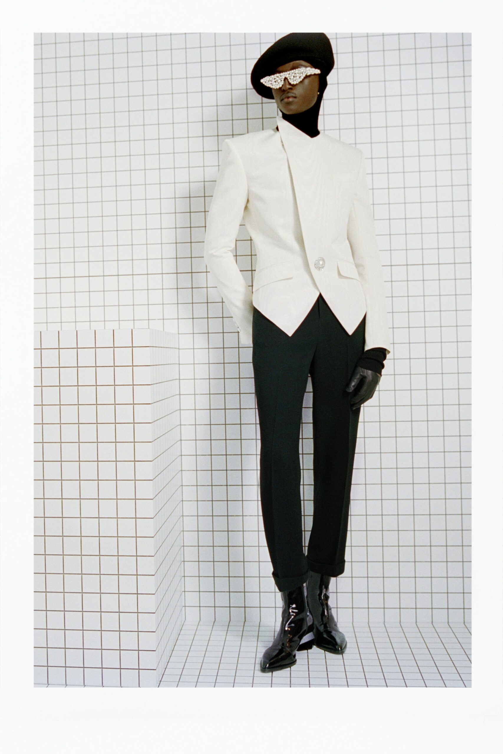 white tailored blazer with black pants