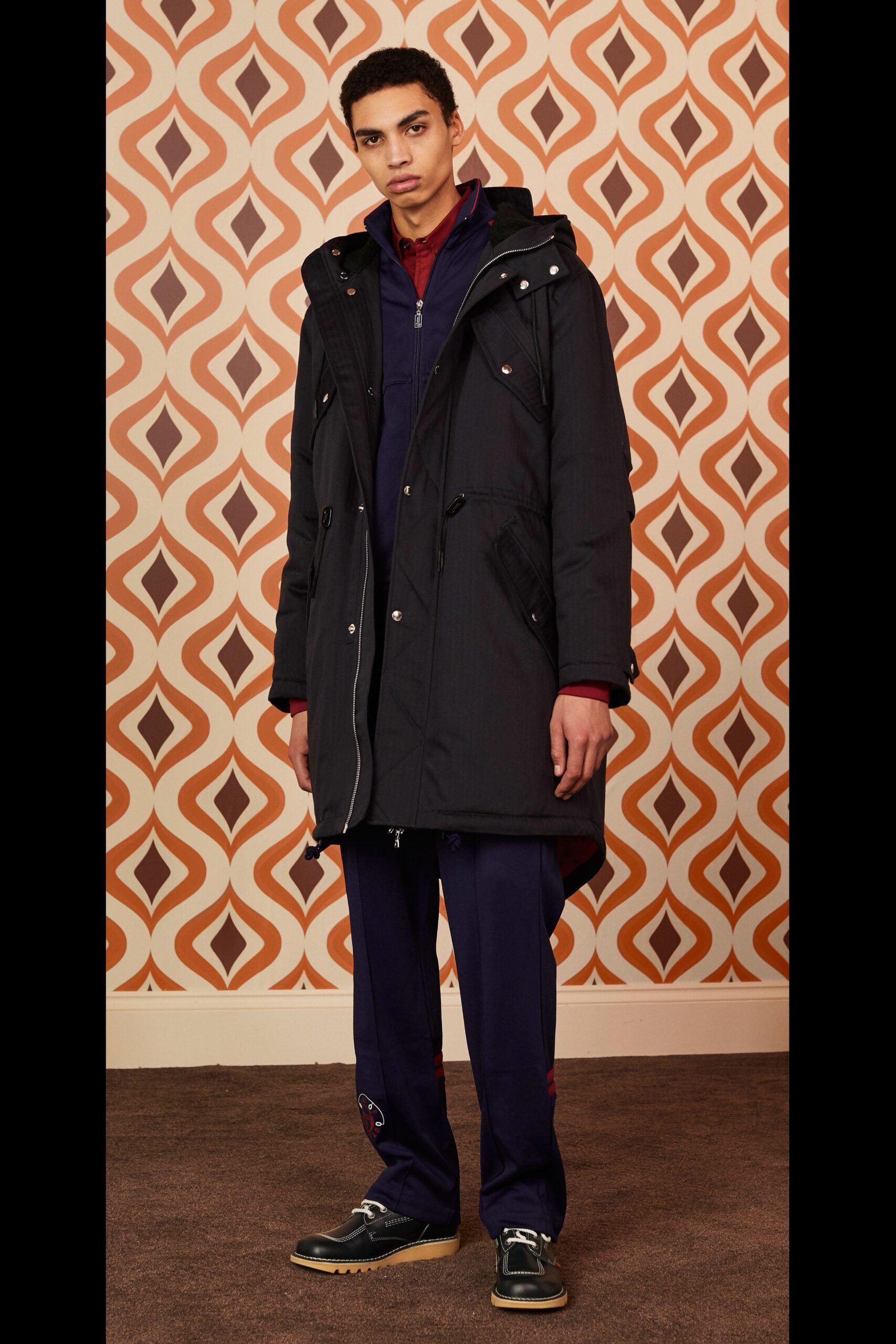 black relaxed parka with navy pants