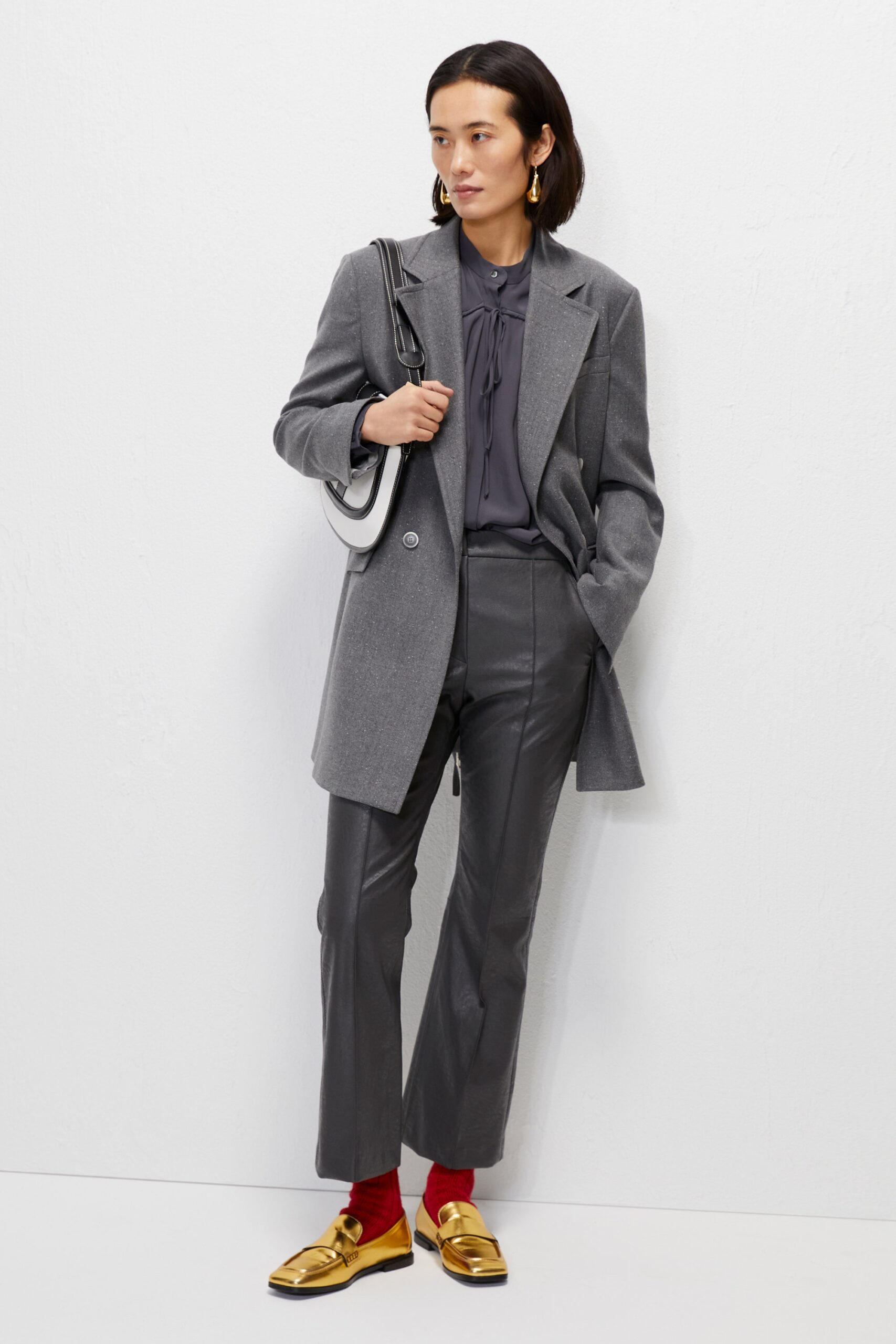 gray tailored blazer with leather pants