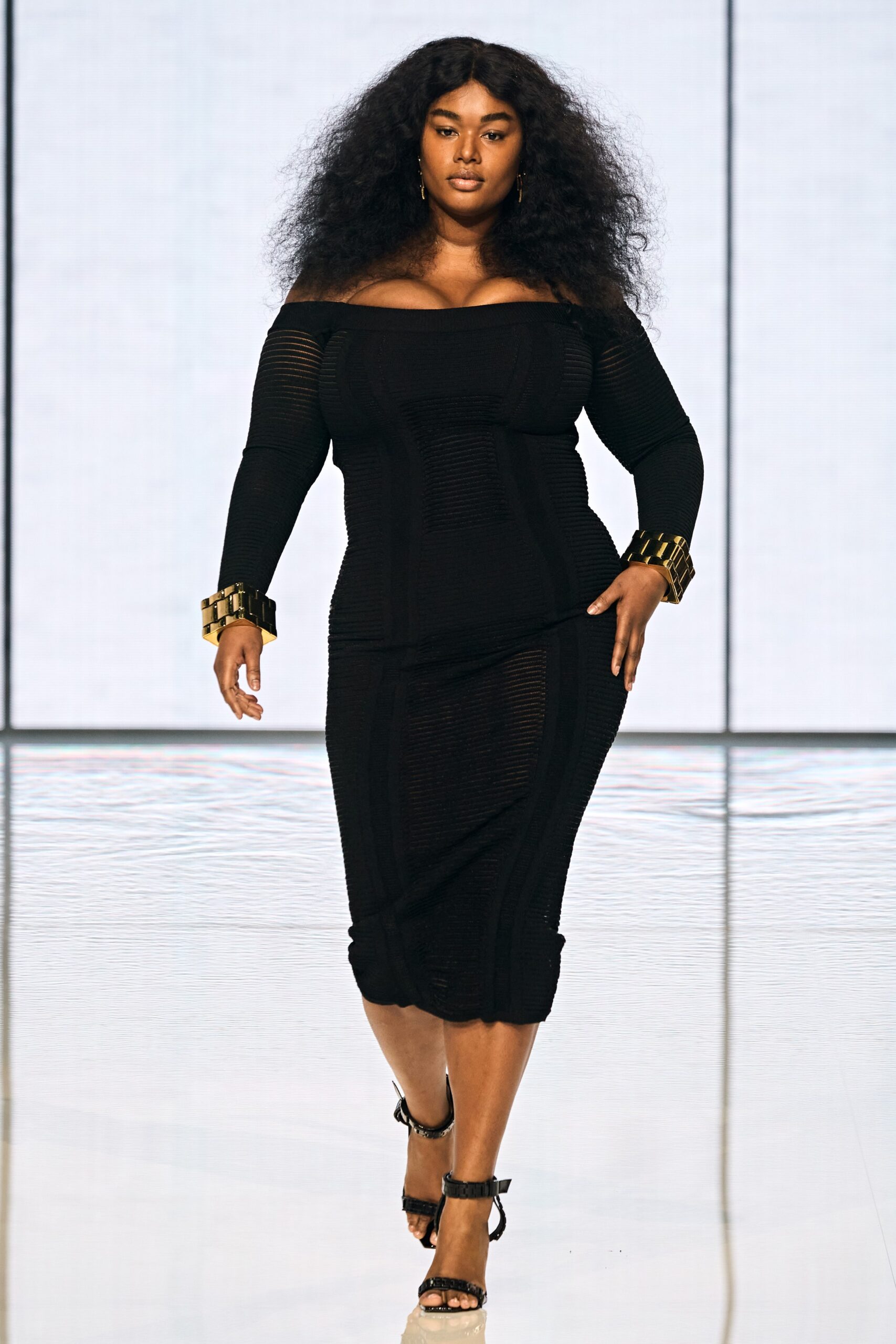 black fitted off-shoulder dress