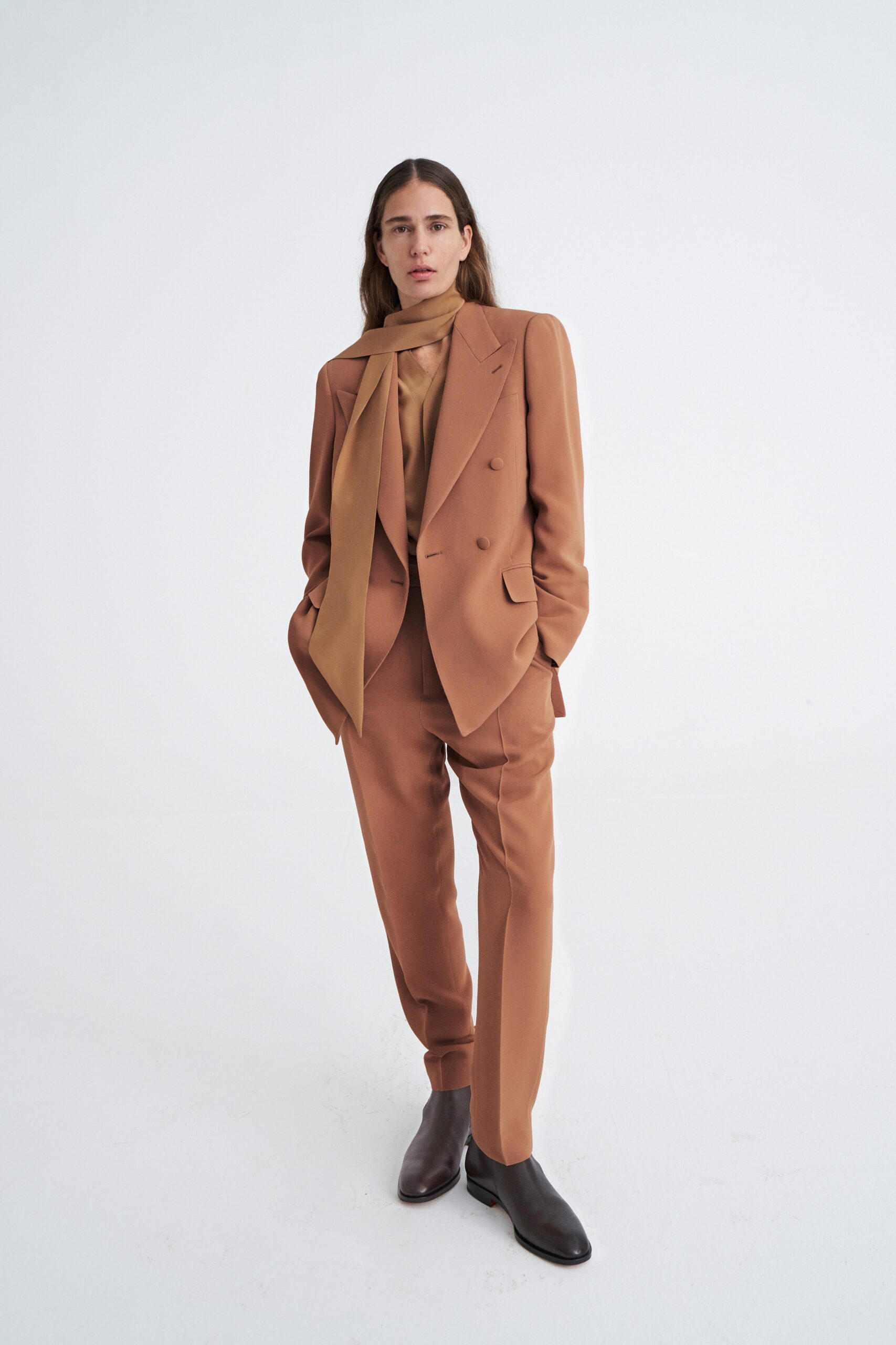 brown tailored suit with scarf