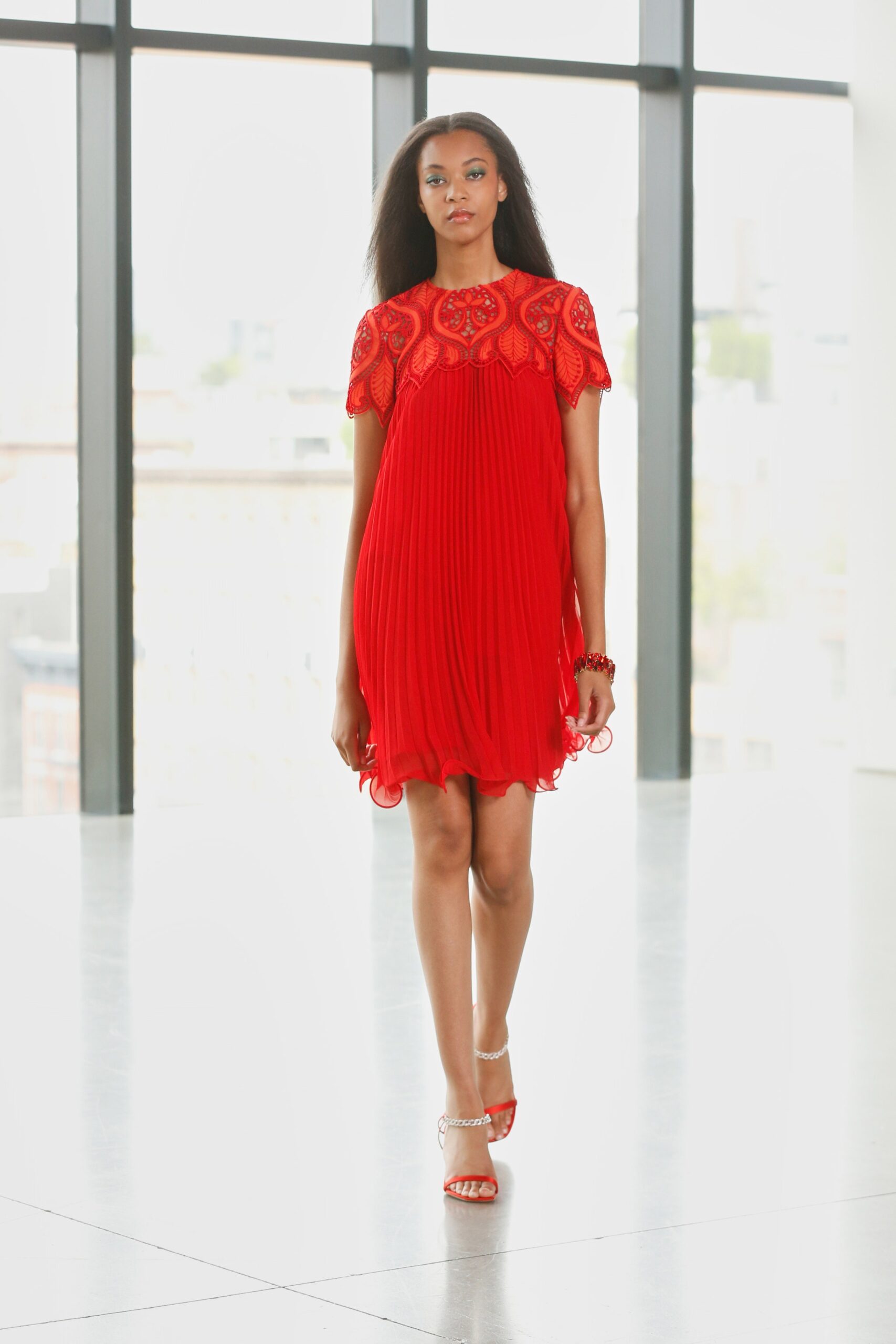 red silk pleated mini dress