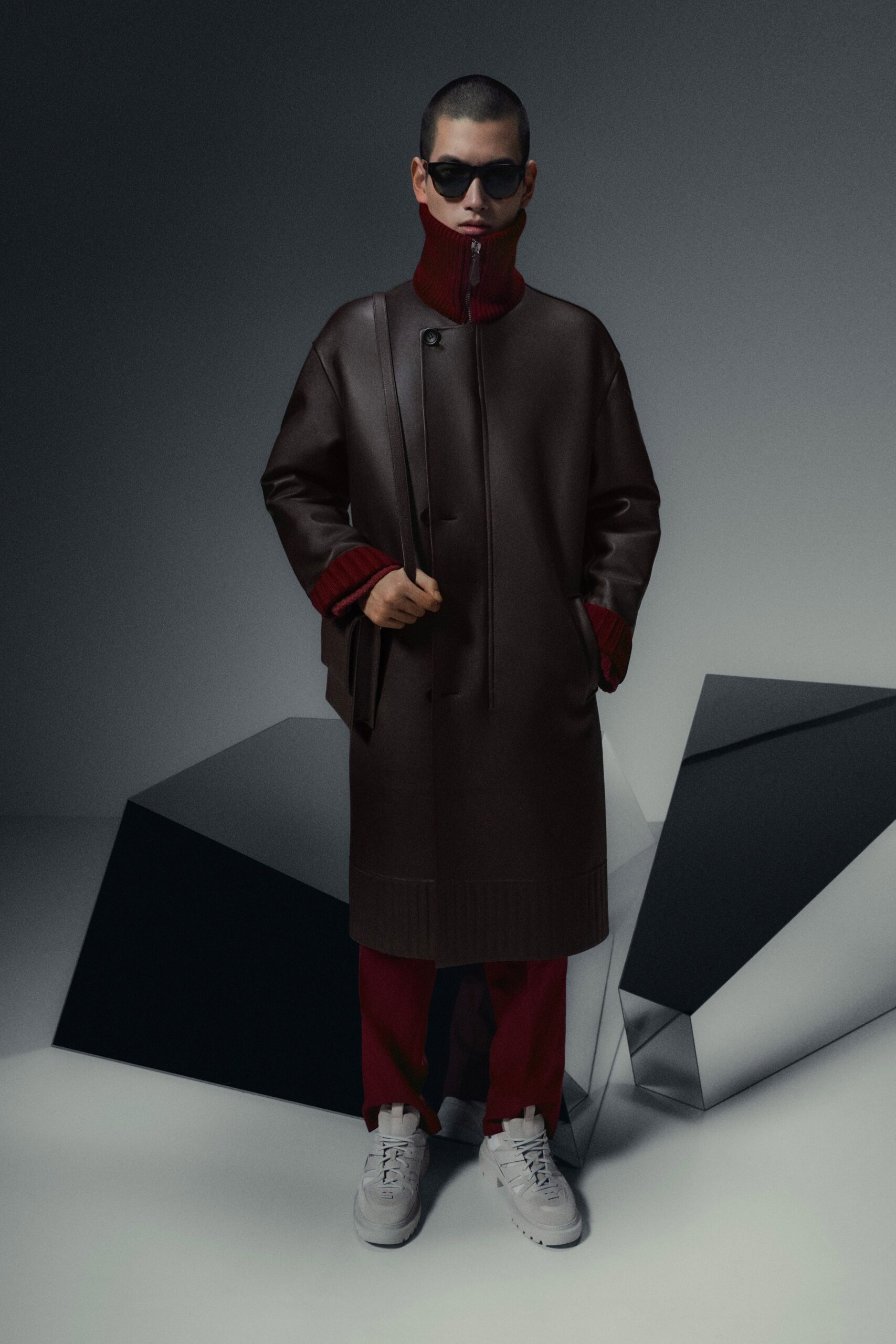brown leather coat with red pants