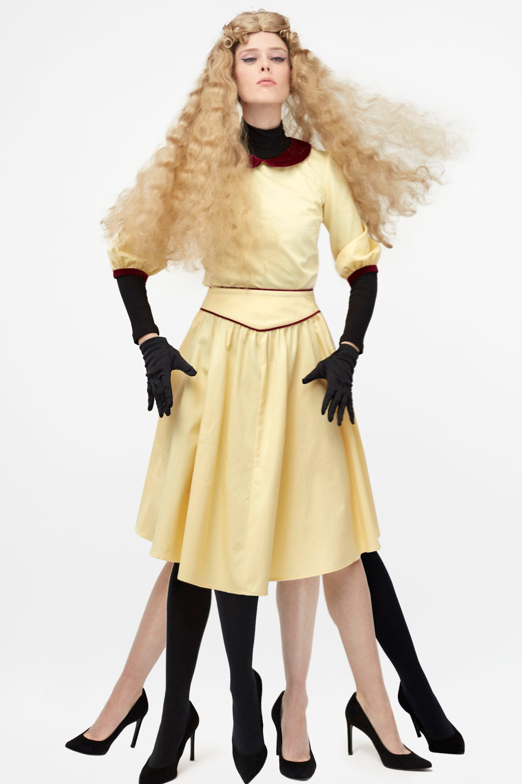yellow fitted midi dress with gloves