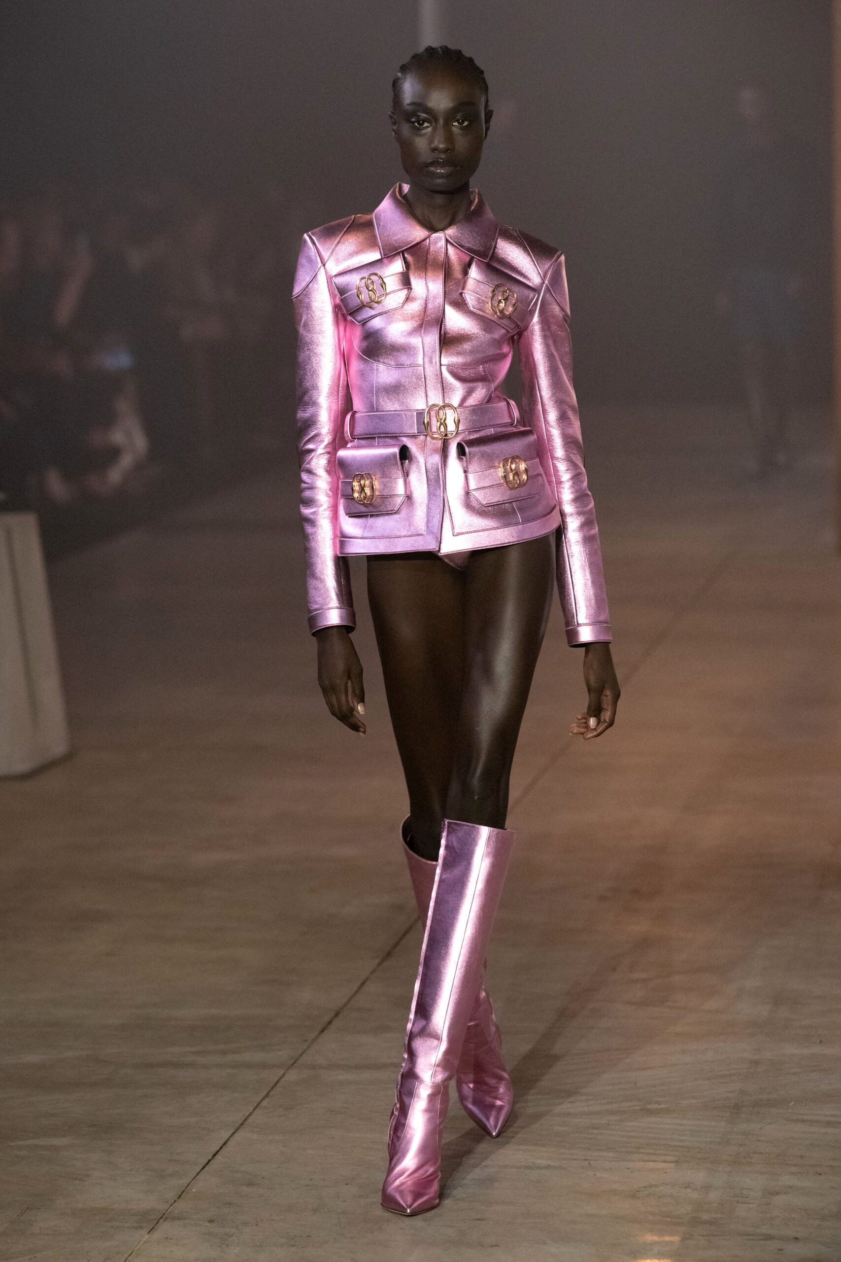 fitted pink vinyl jacket and boots