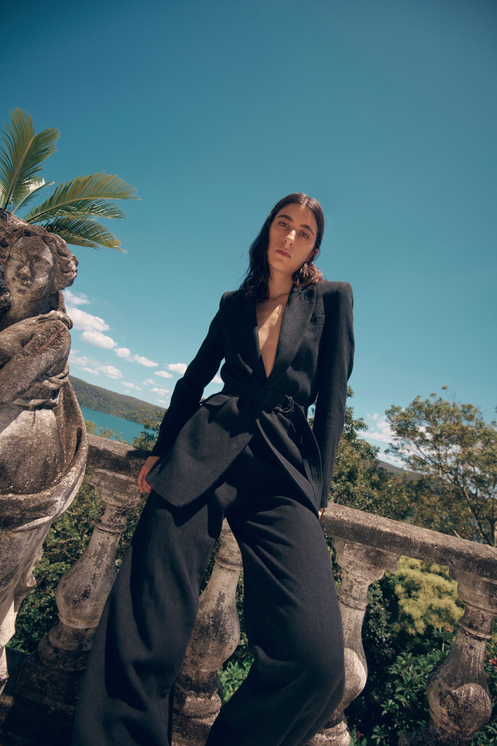 black tailored blazer and relaxed pants