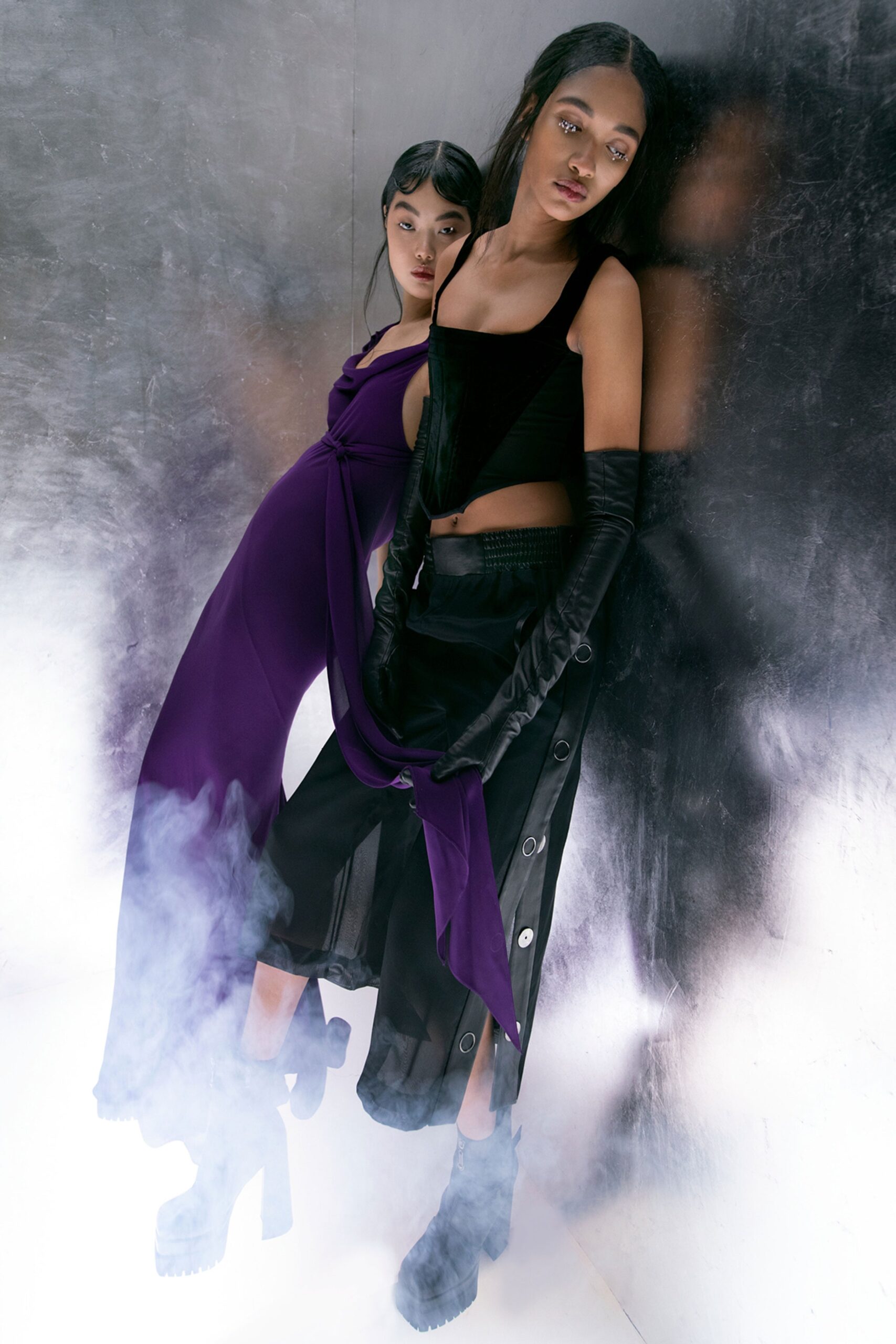 purple draped midi dress and black outfit