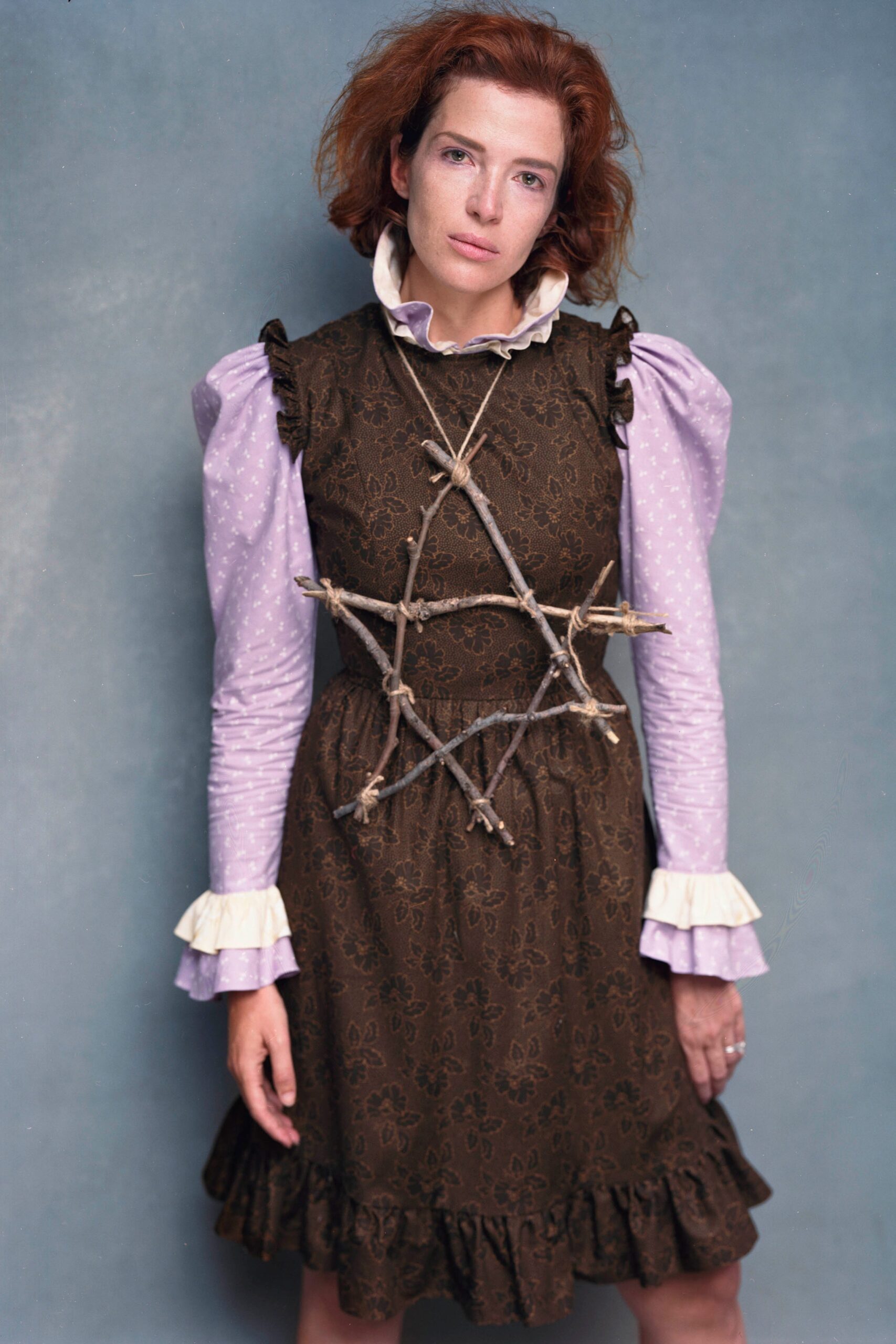 brown mini dress with purple shirt