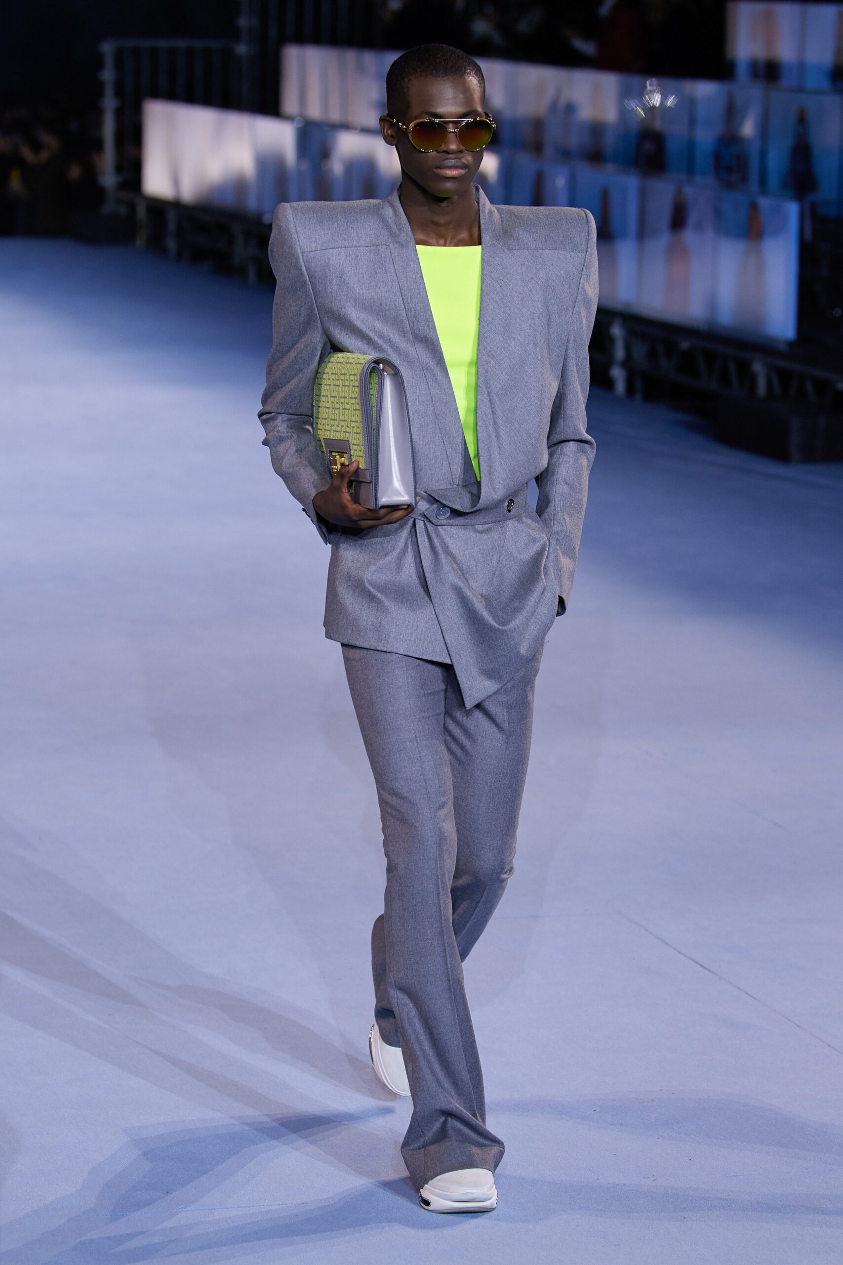 gray tailored suit with neon top
