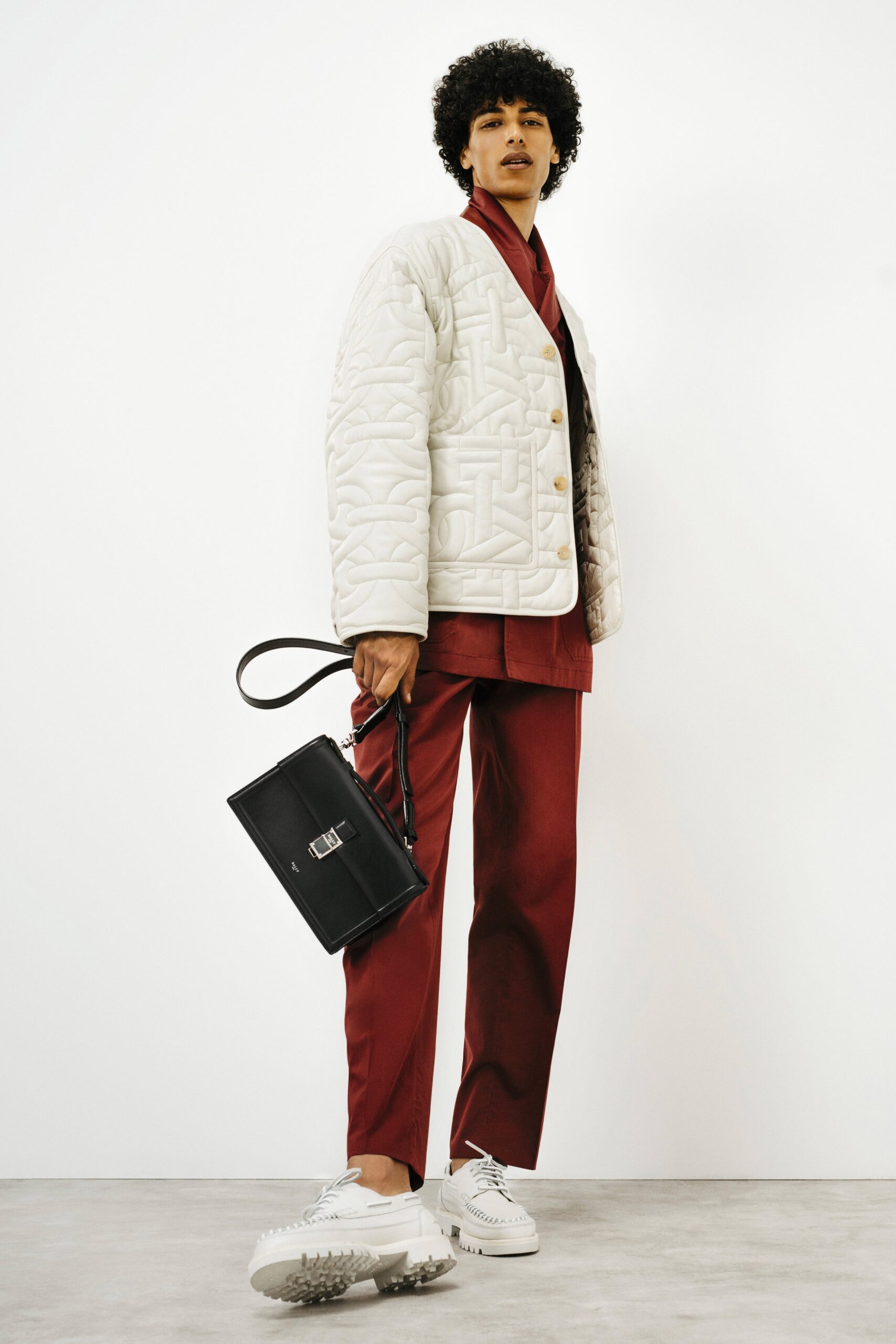 white cotton long-sleeve collared relaxed buttoned quilted jacket