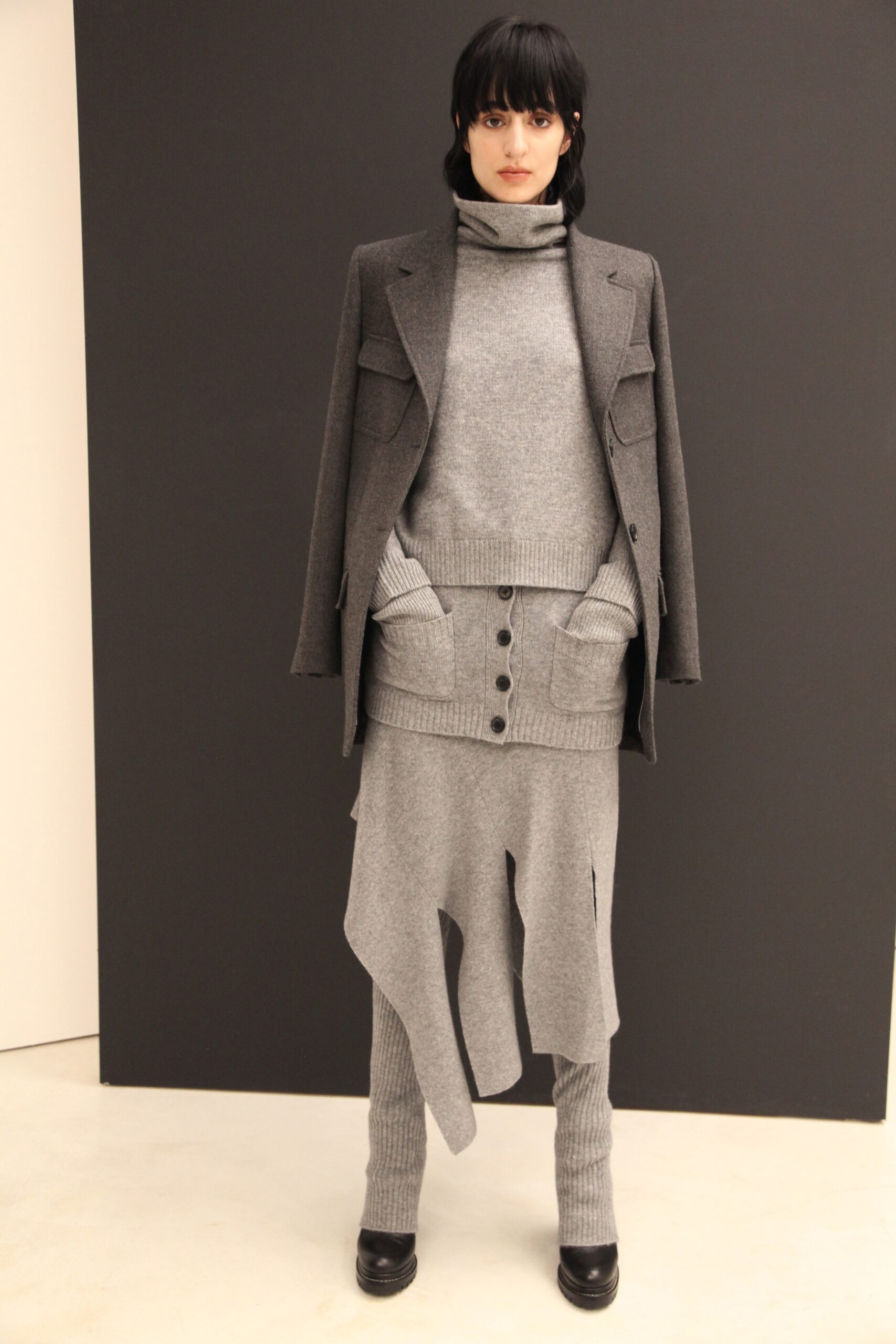 gray wool asymmetric relaxed buttoned skirt