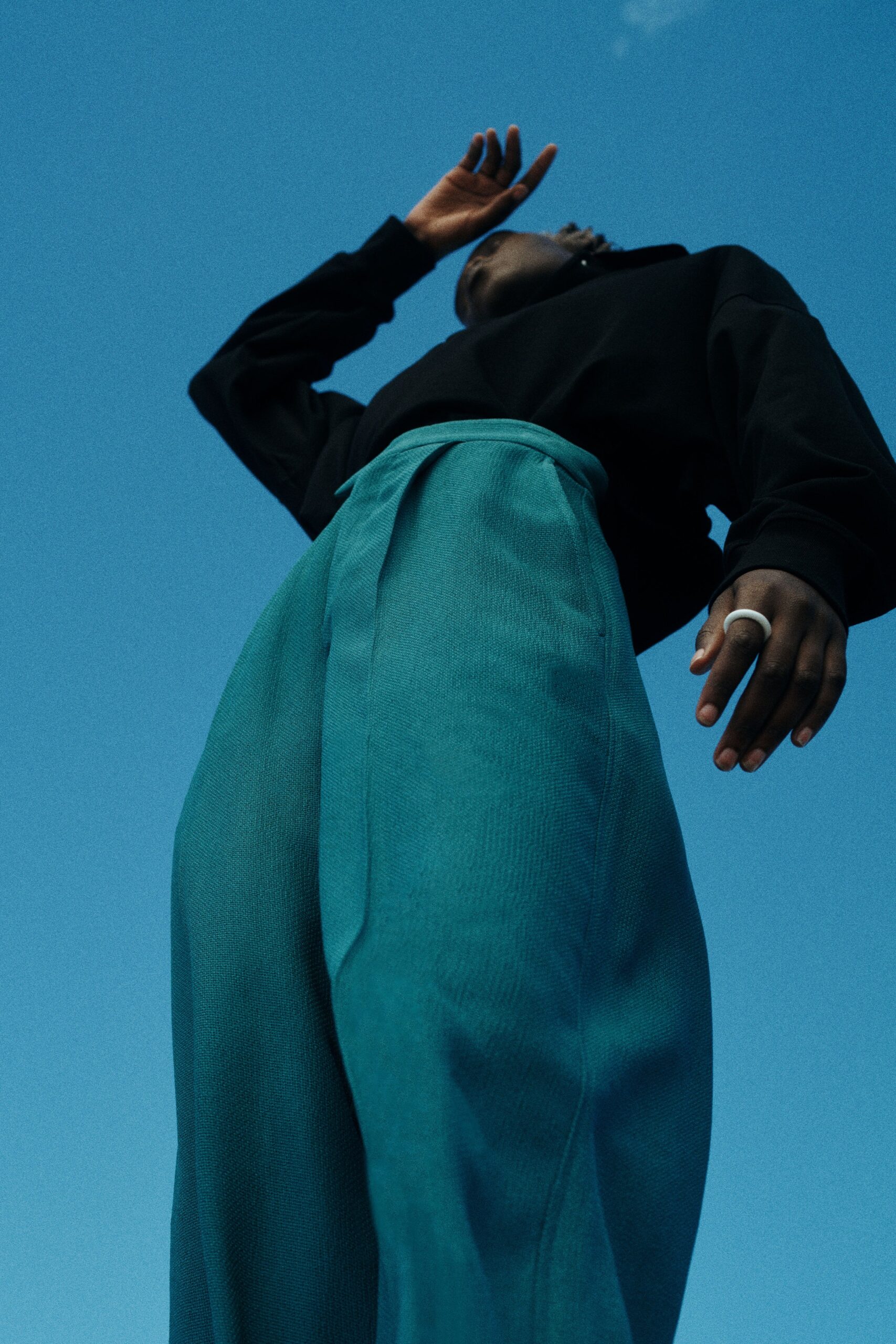 black relaxed top teal wide-leg pants