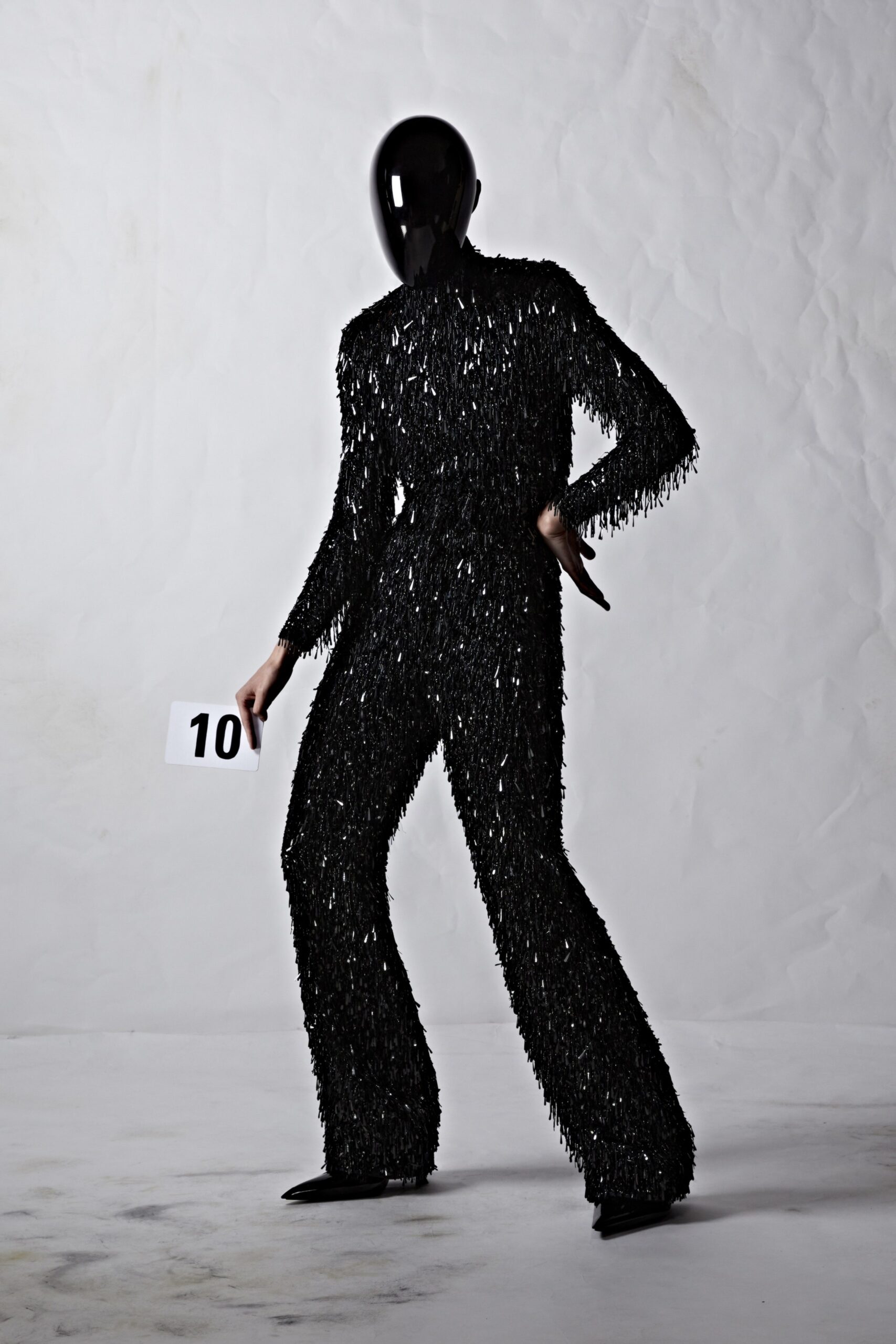 black fringed fitted jumpsuit
