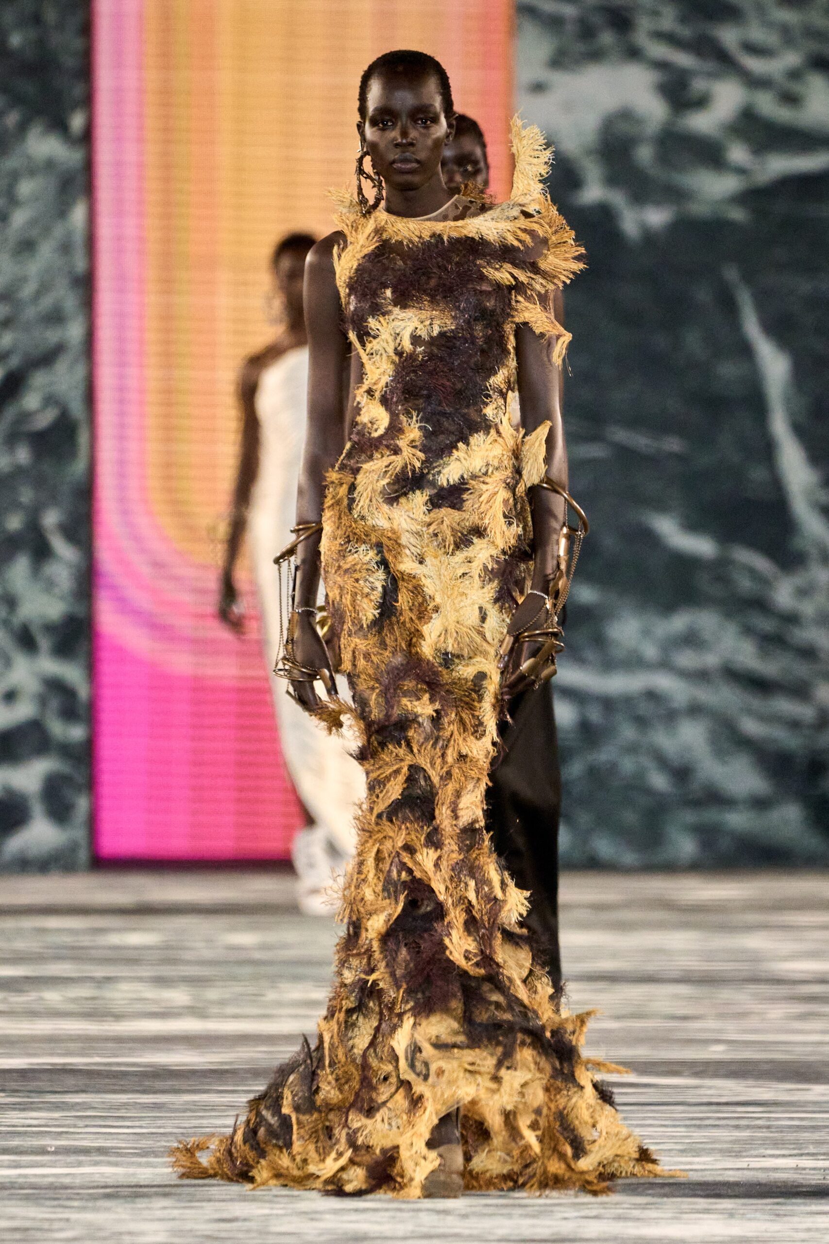 brown and gold draped gown