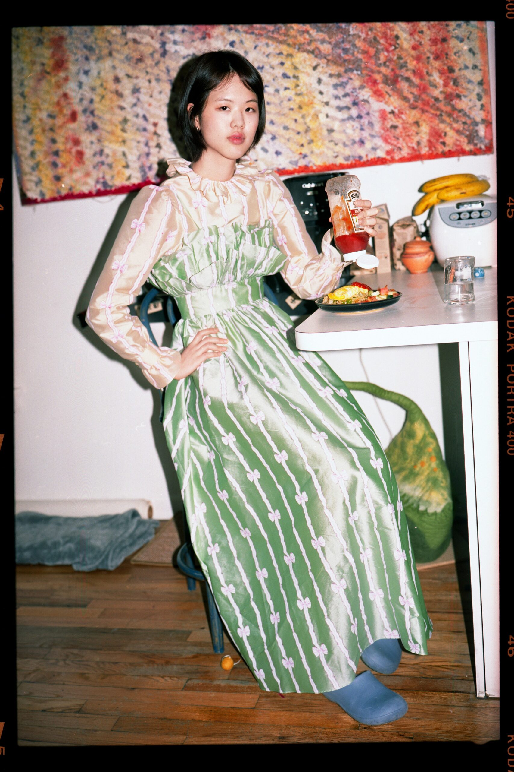 green and white pleated maxi dress