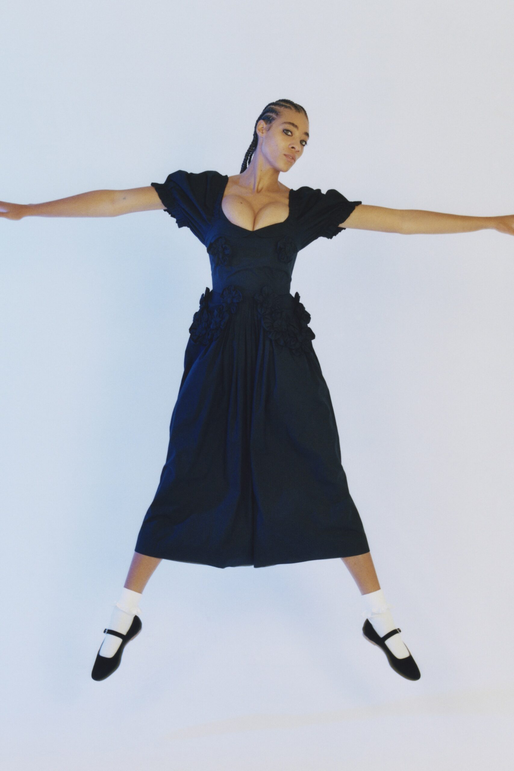 black fitted midi dress