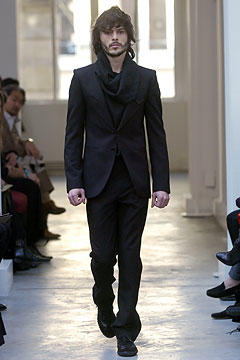 black tailored suit with scarf
