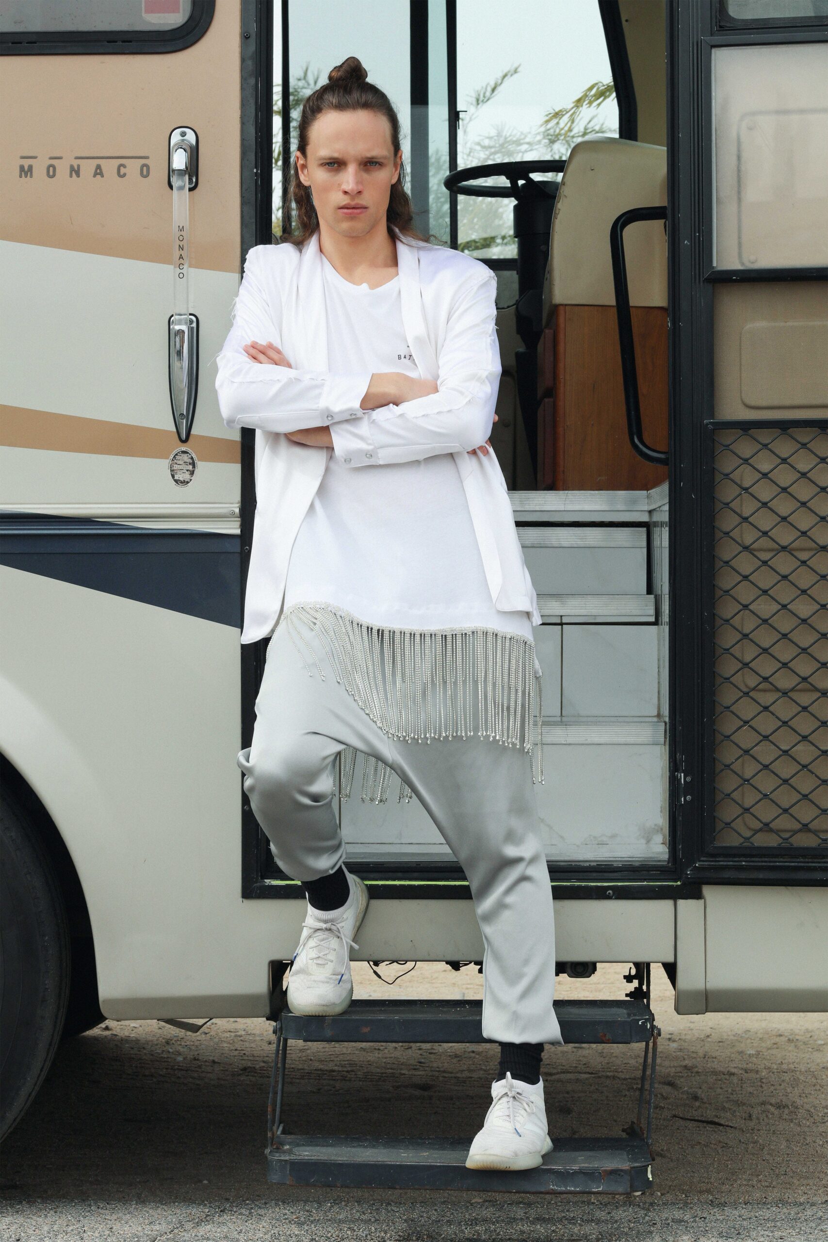 white blazer with fringed detail