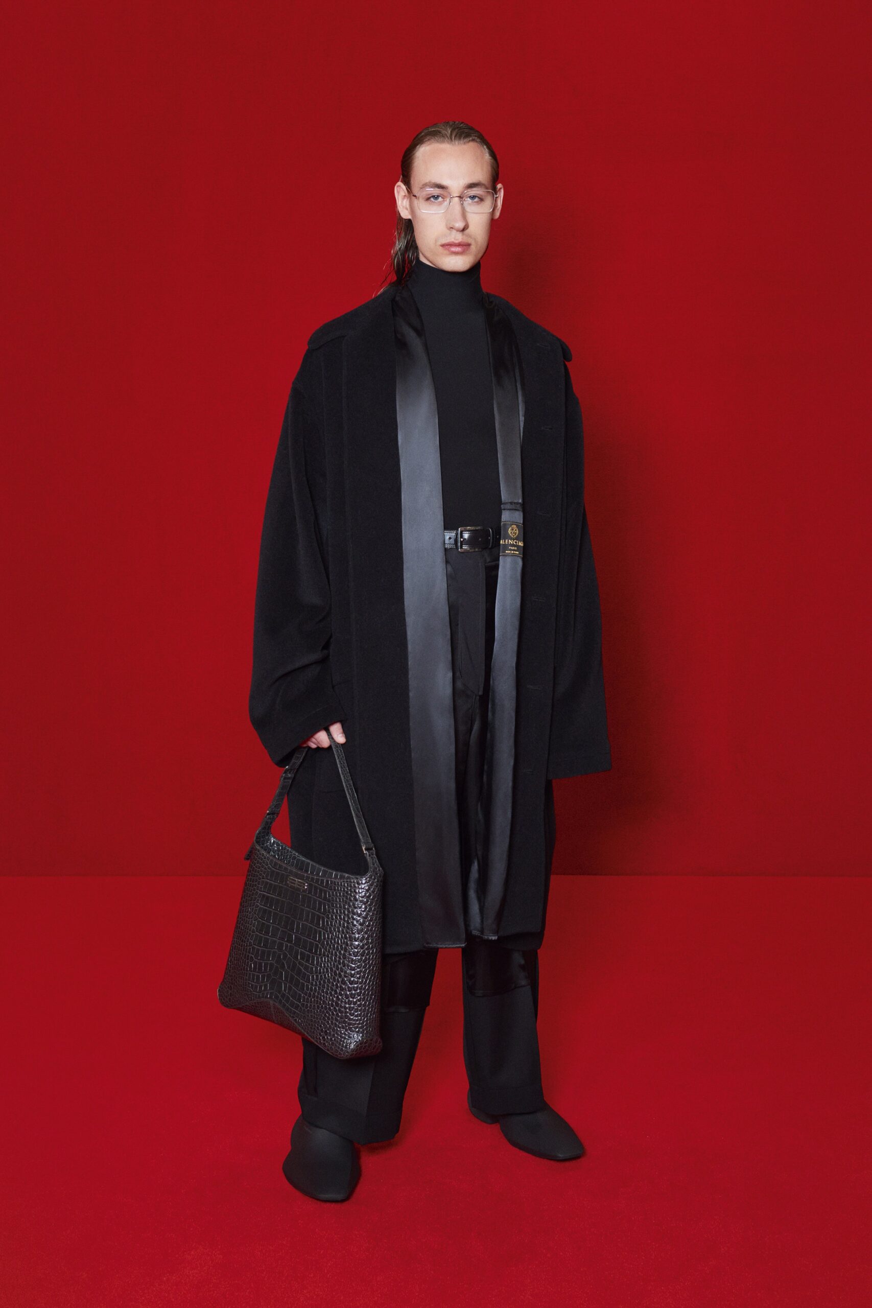 black wool long-sleeve collared oversized buttoned coat