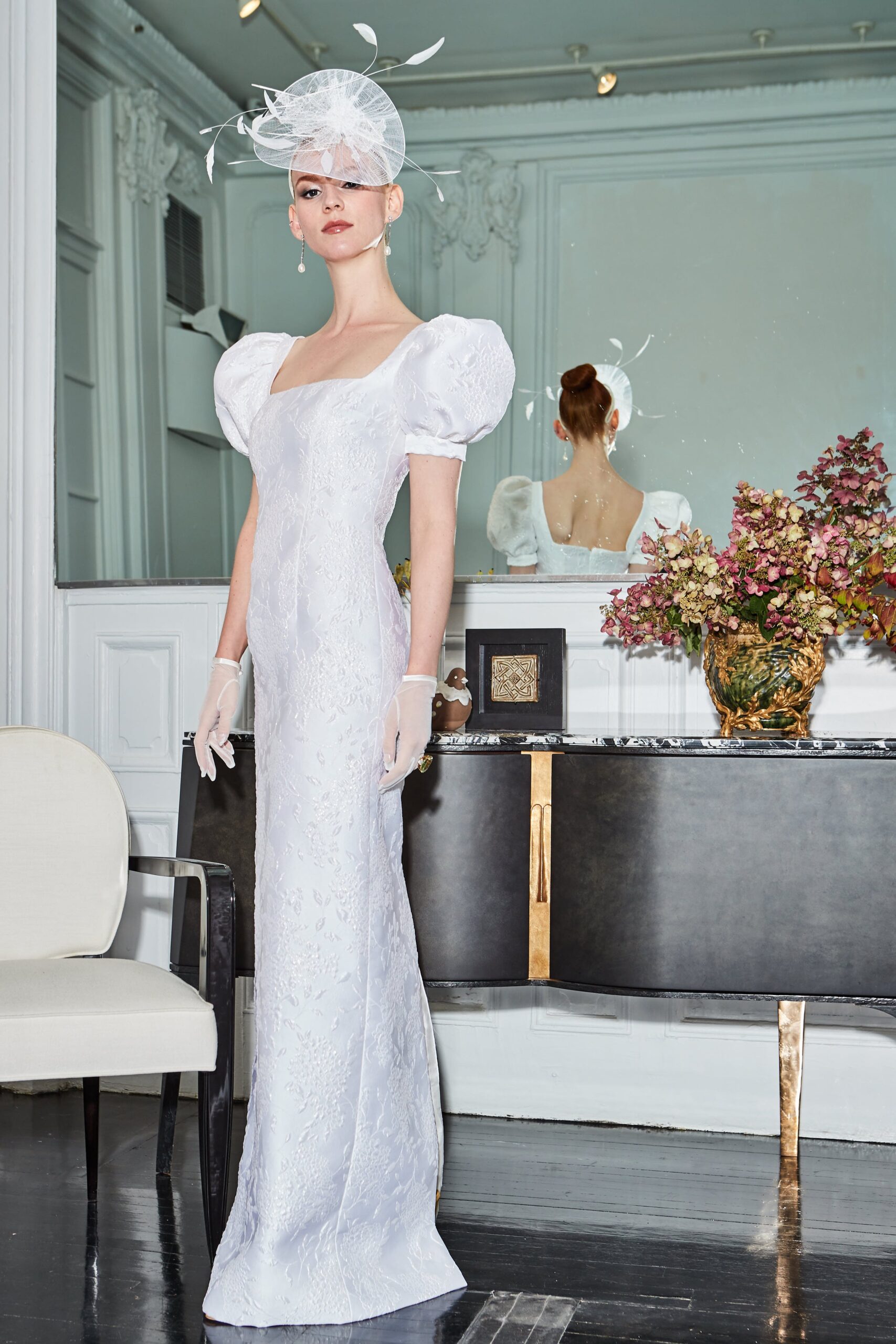 white embroidered fitted gown