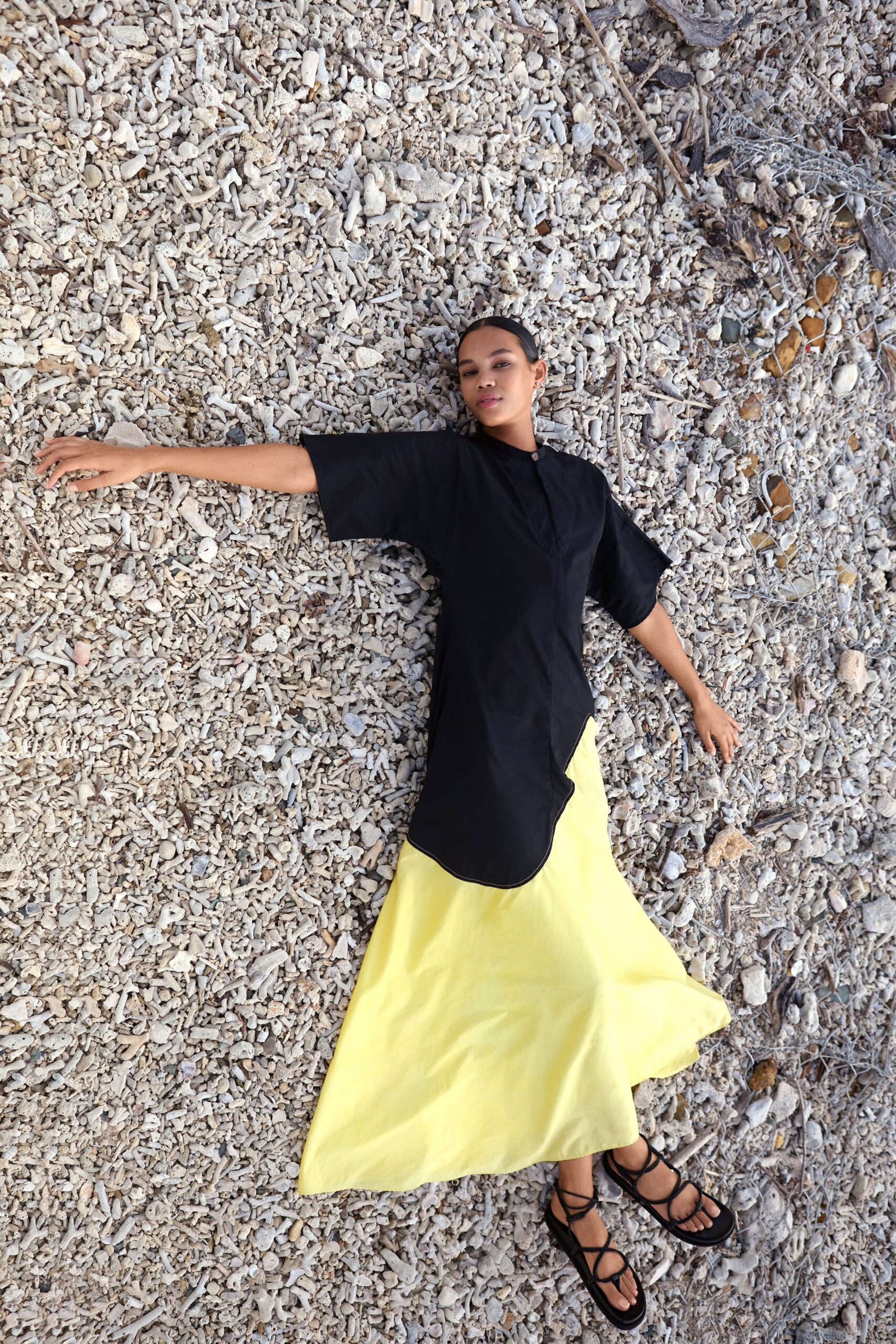 black relaxed top with yellow maxi skirt