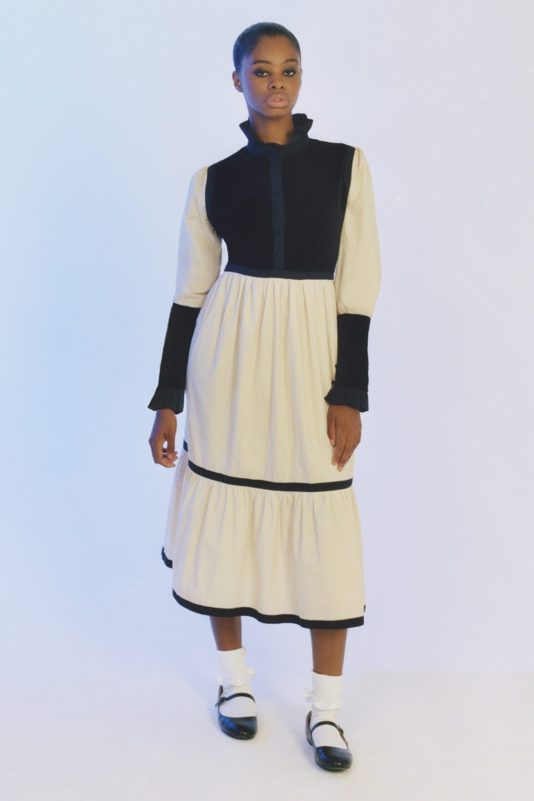 black and beige tiered dress