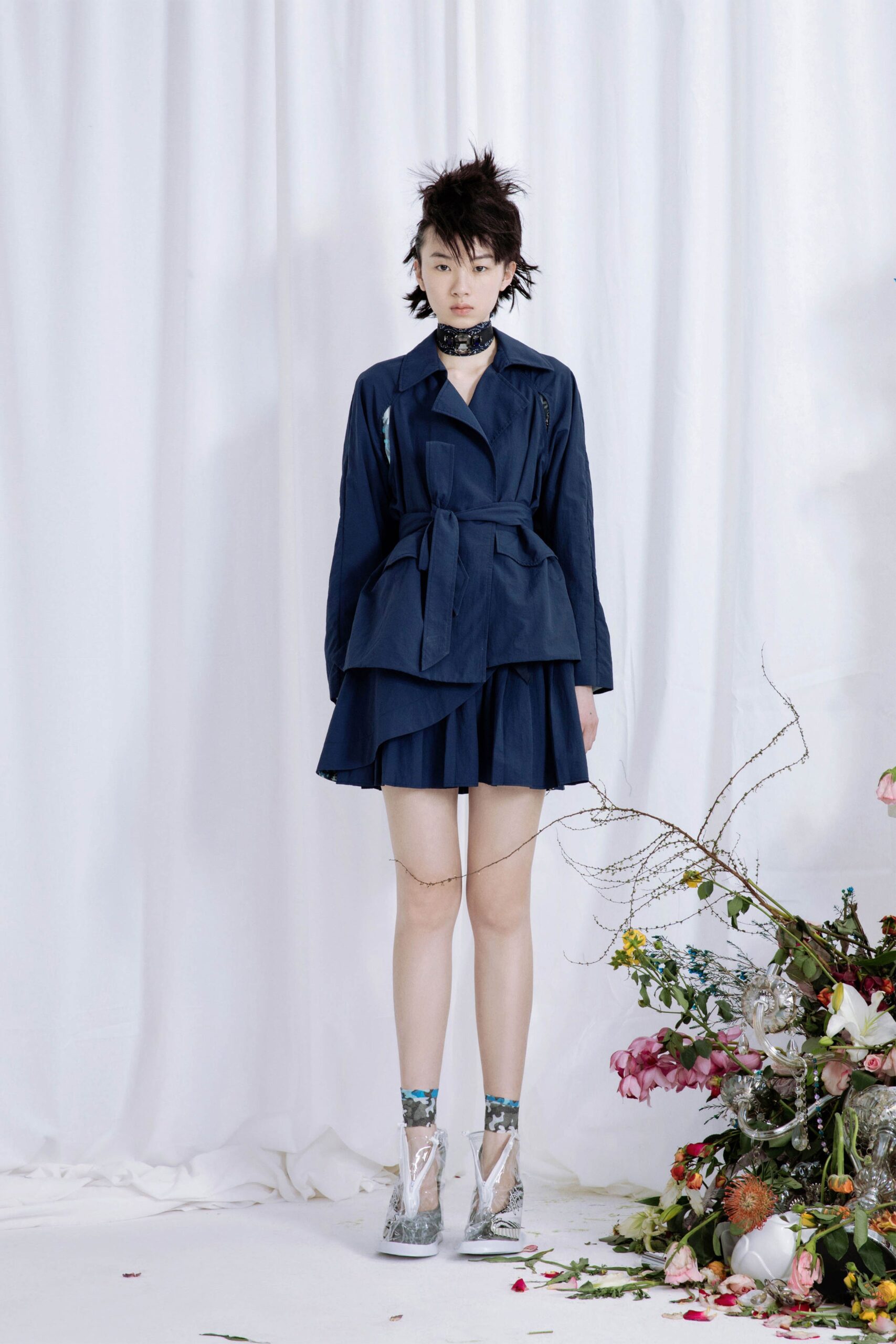 blue fitted jacket and mini skirt