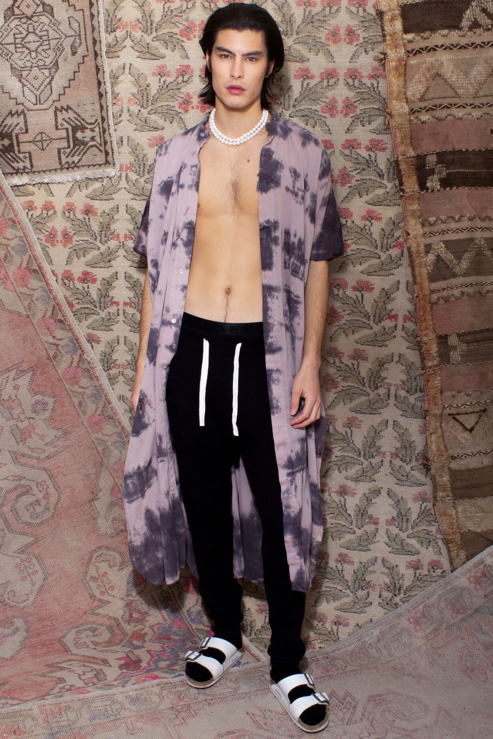 purple printed shirt with black pants