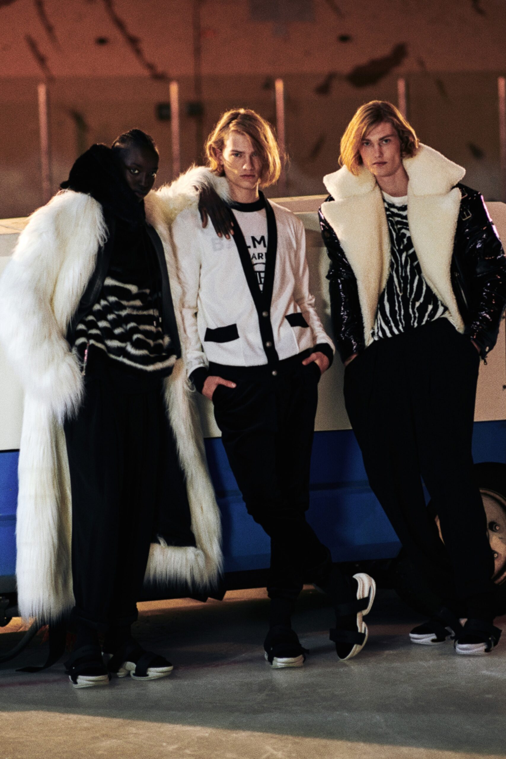 oversized white fur coat and tailored blazer
