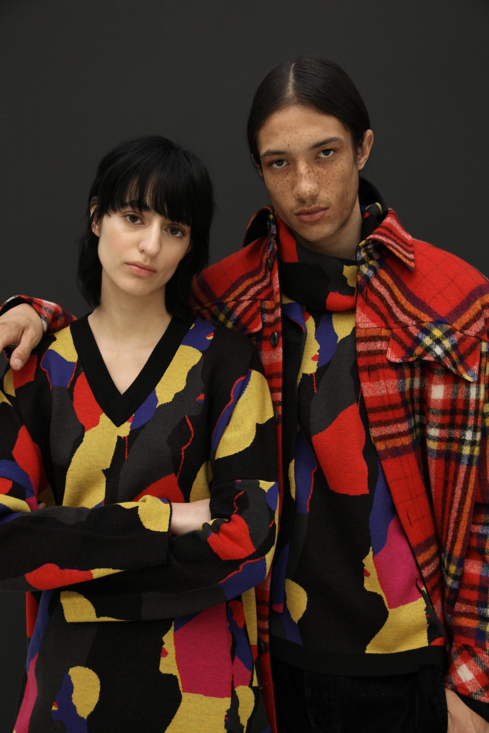 colorful printed sweater and checked jacket