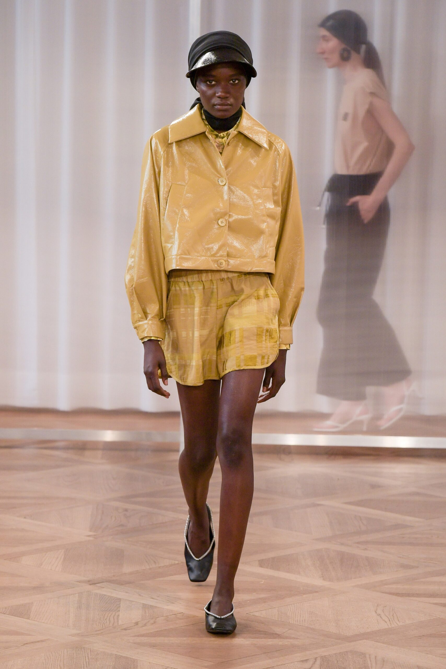 yellow vinyl jacket and shorts