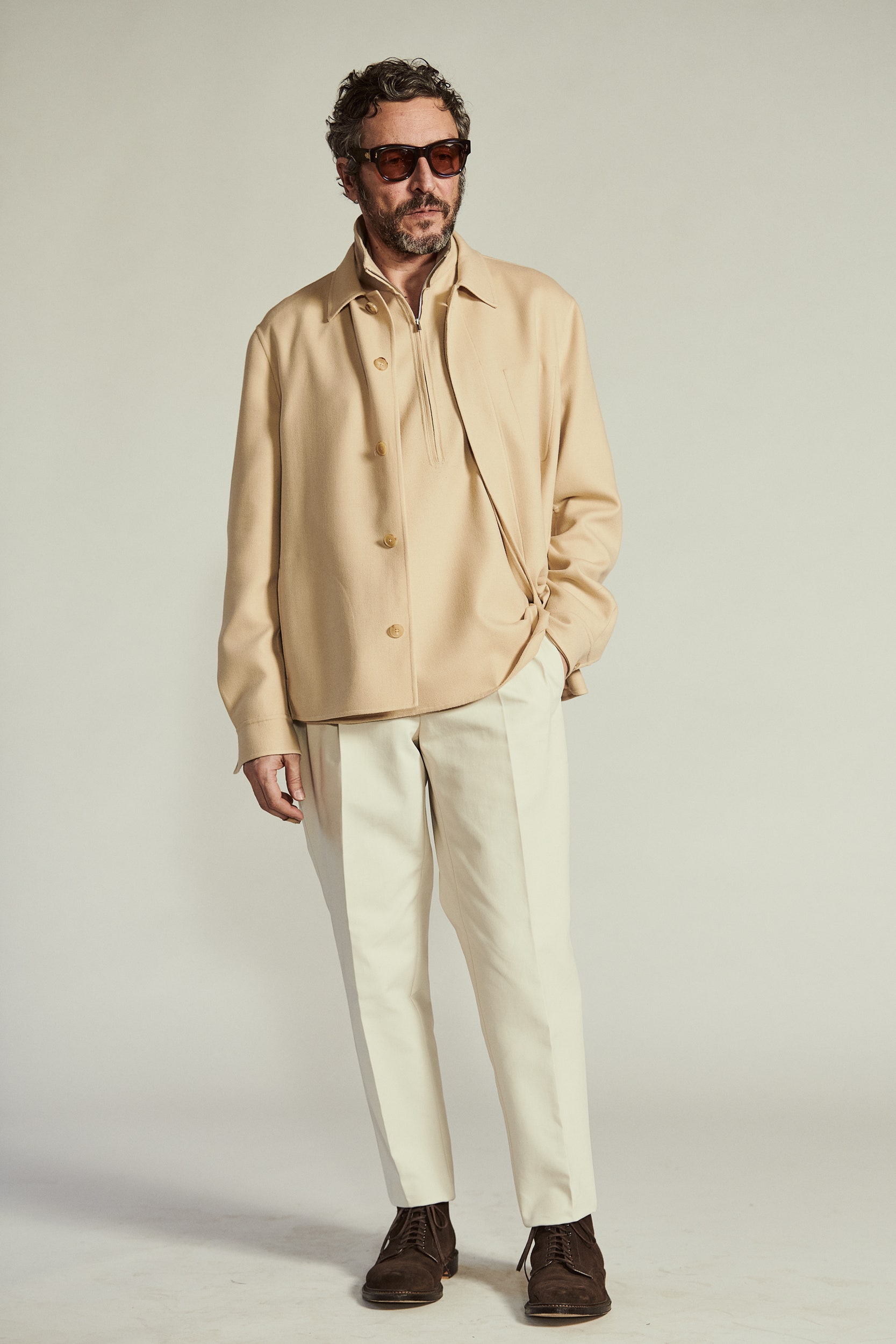 beige relaxed jacket with white pants