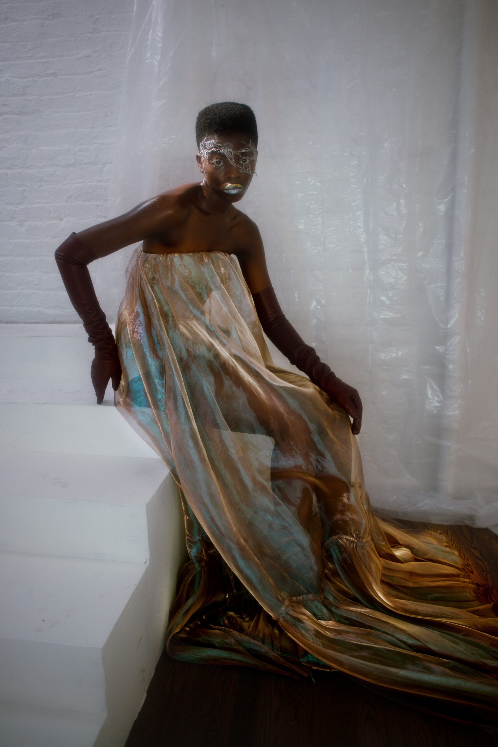 gold and blue draped gown