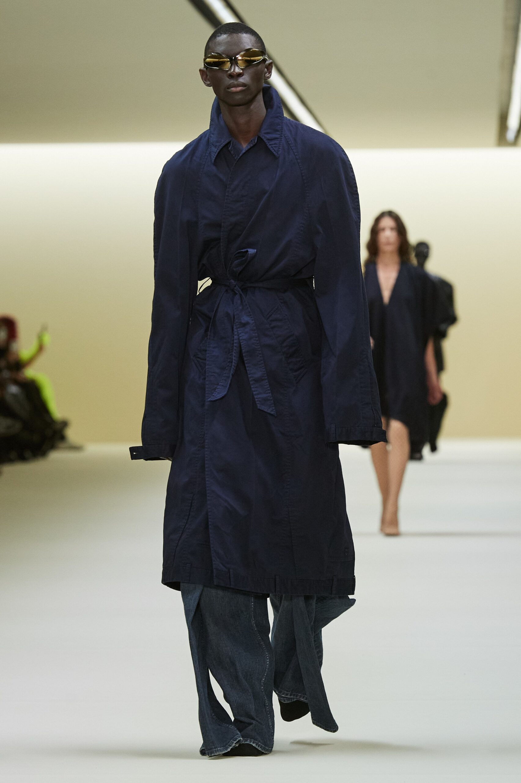 blue cotton trench coat with denim pants