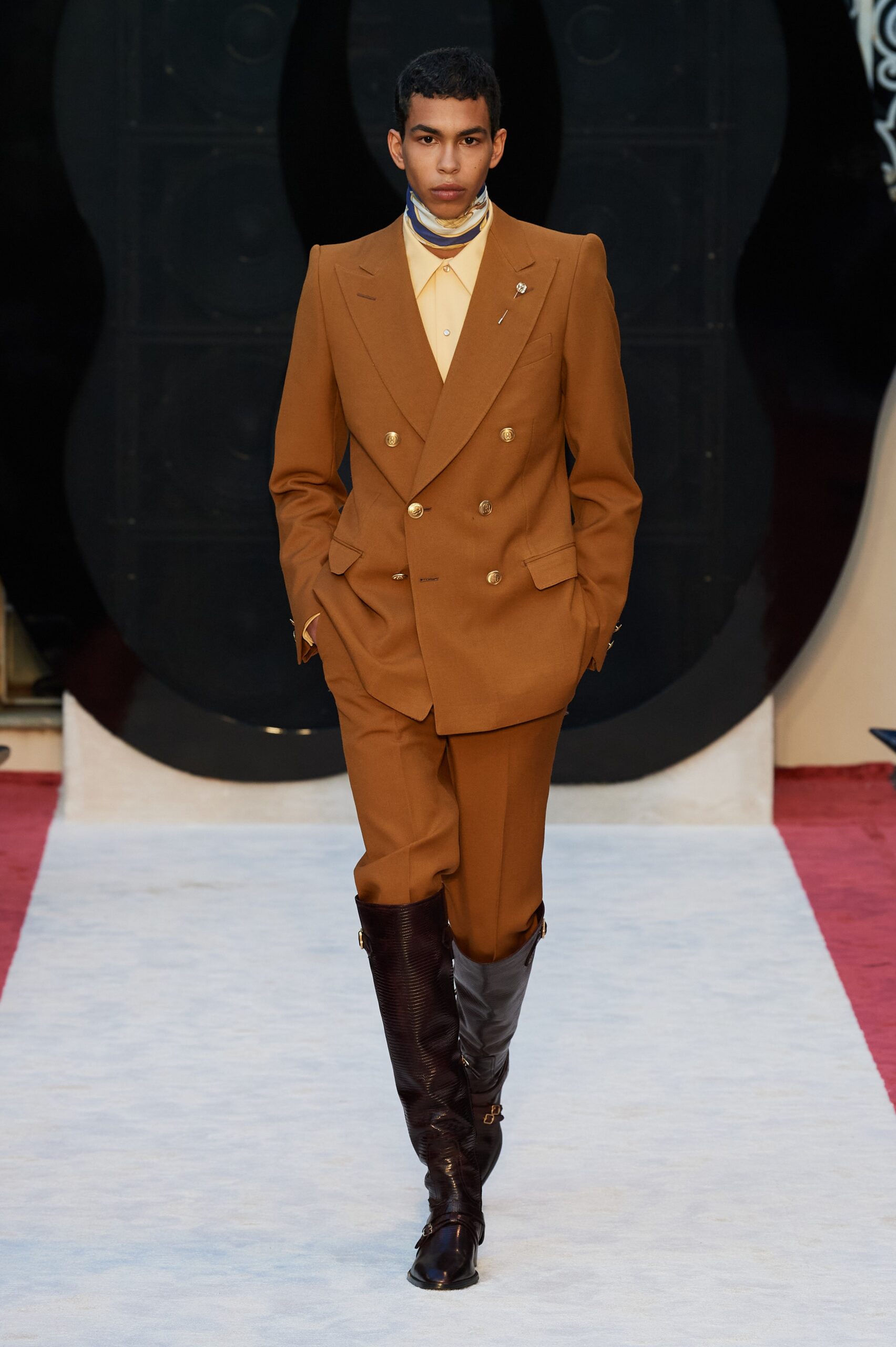 brown tailored suit with yellow shirt